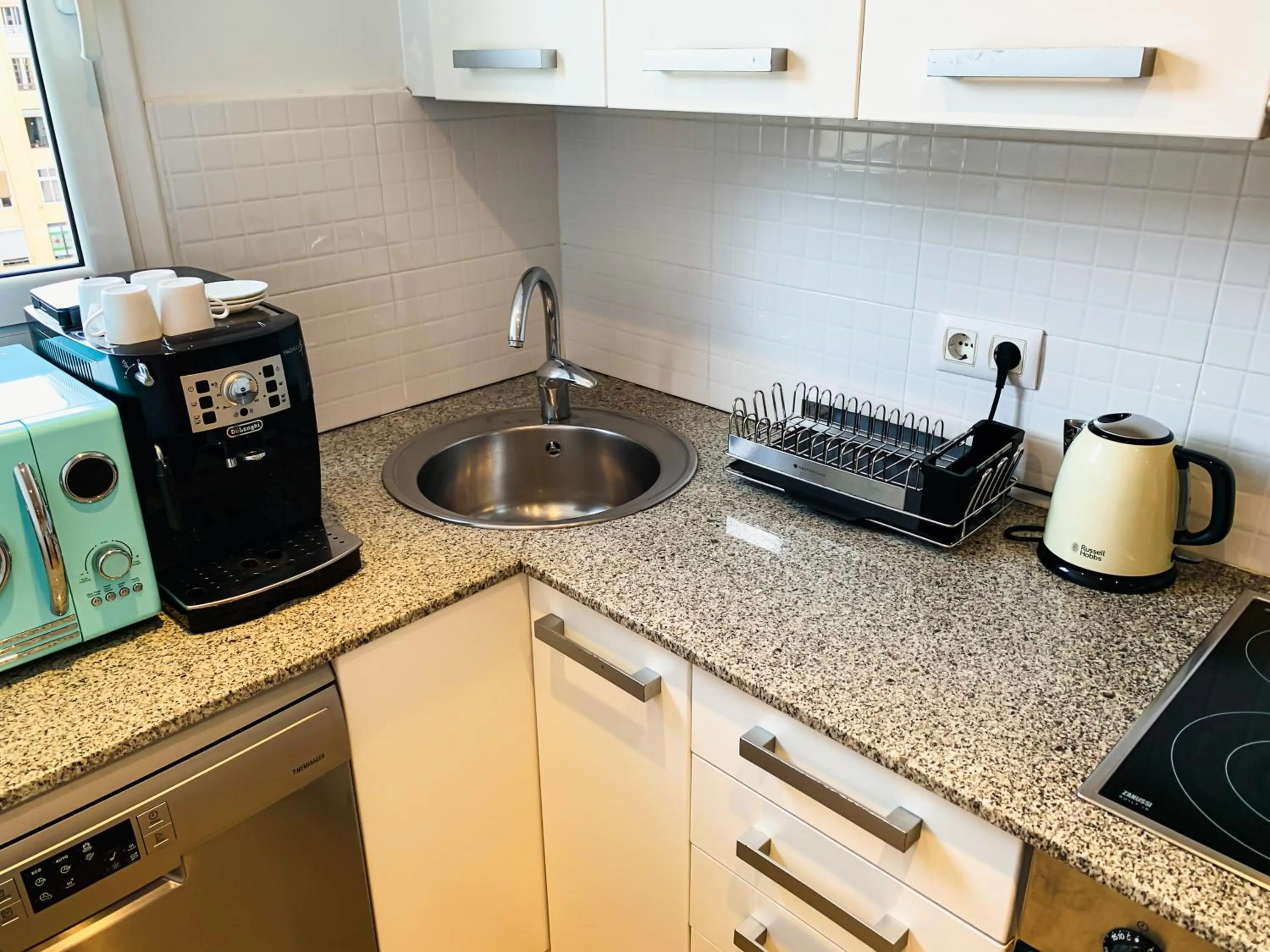 Coffee/tea facilities in Incredible 2BR Penthouse with Urban Rooftop Garden