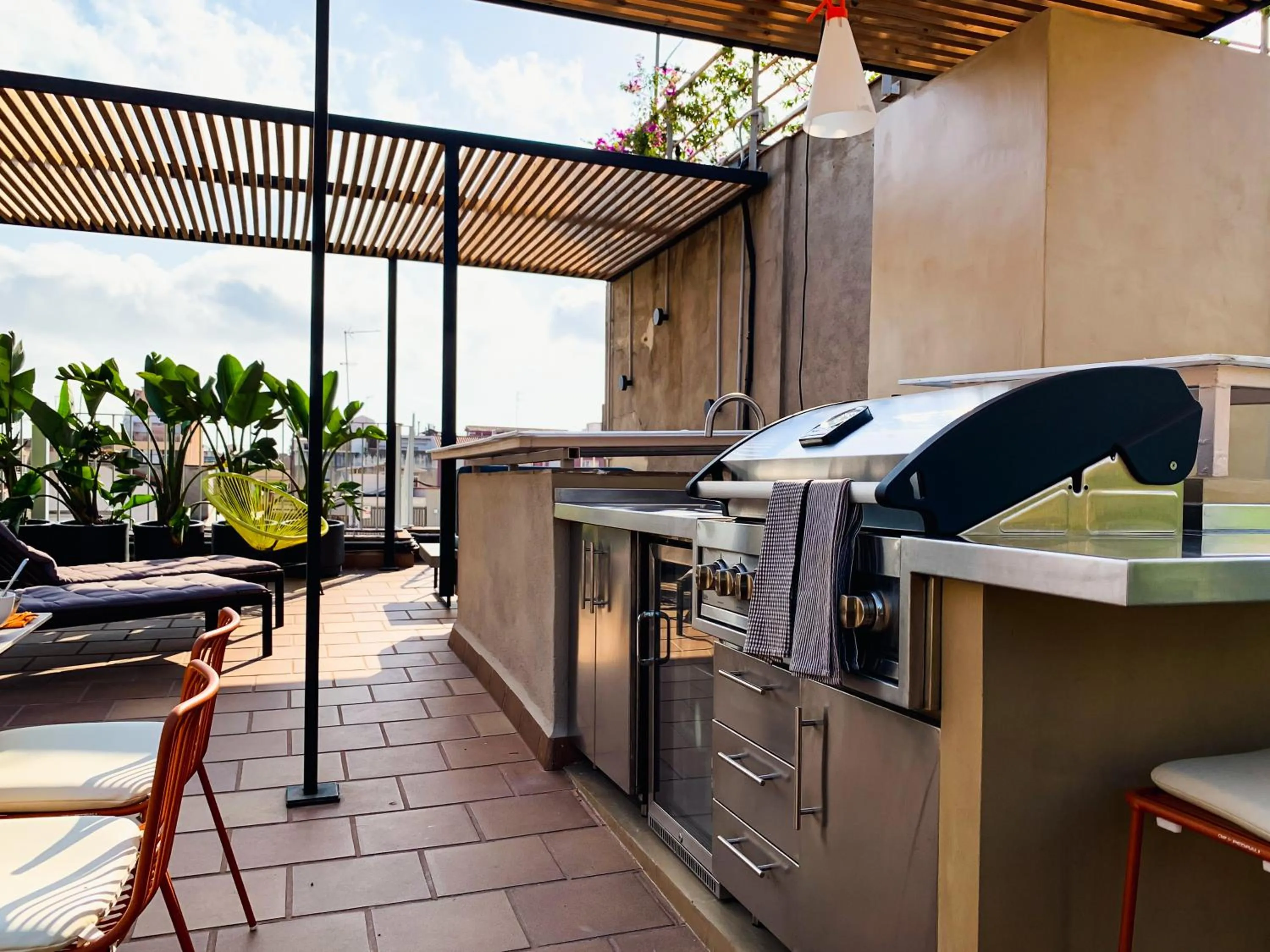 BBQ facilities in Incredible 2BR Penthouse with Urban Rooftop Garden