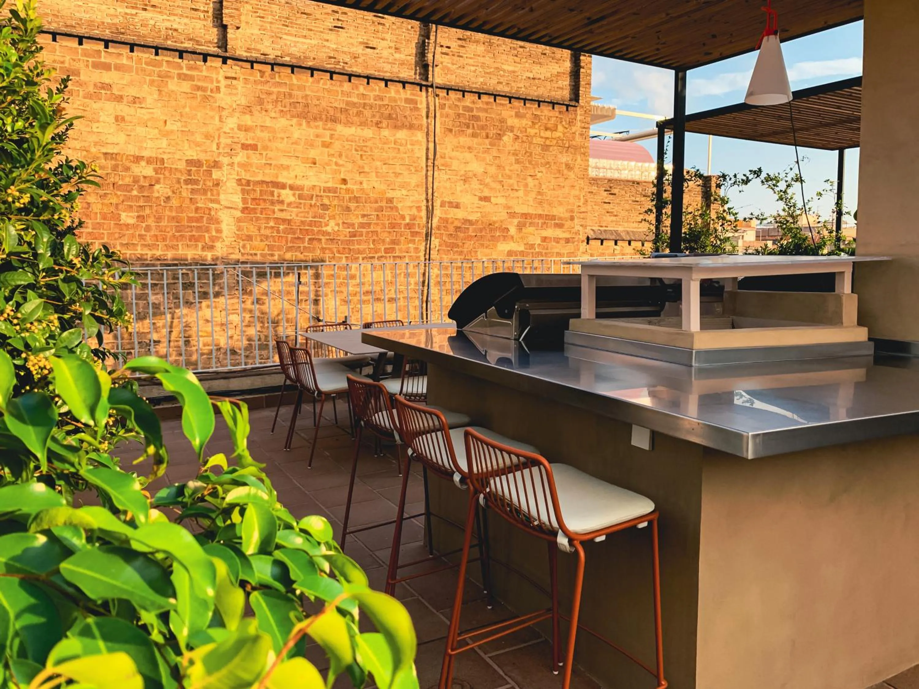 BBQ facilities in Incredible 2BR Penthouse with Urban Rooftop Garden