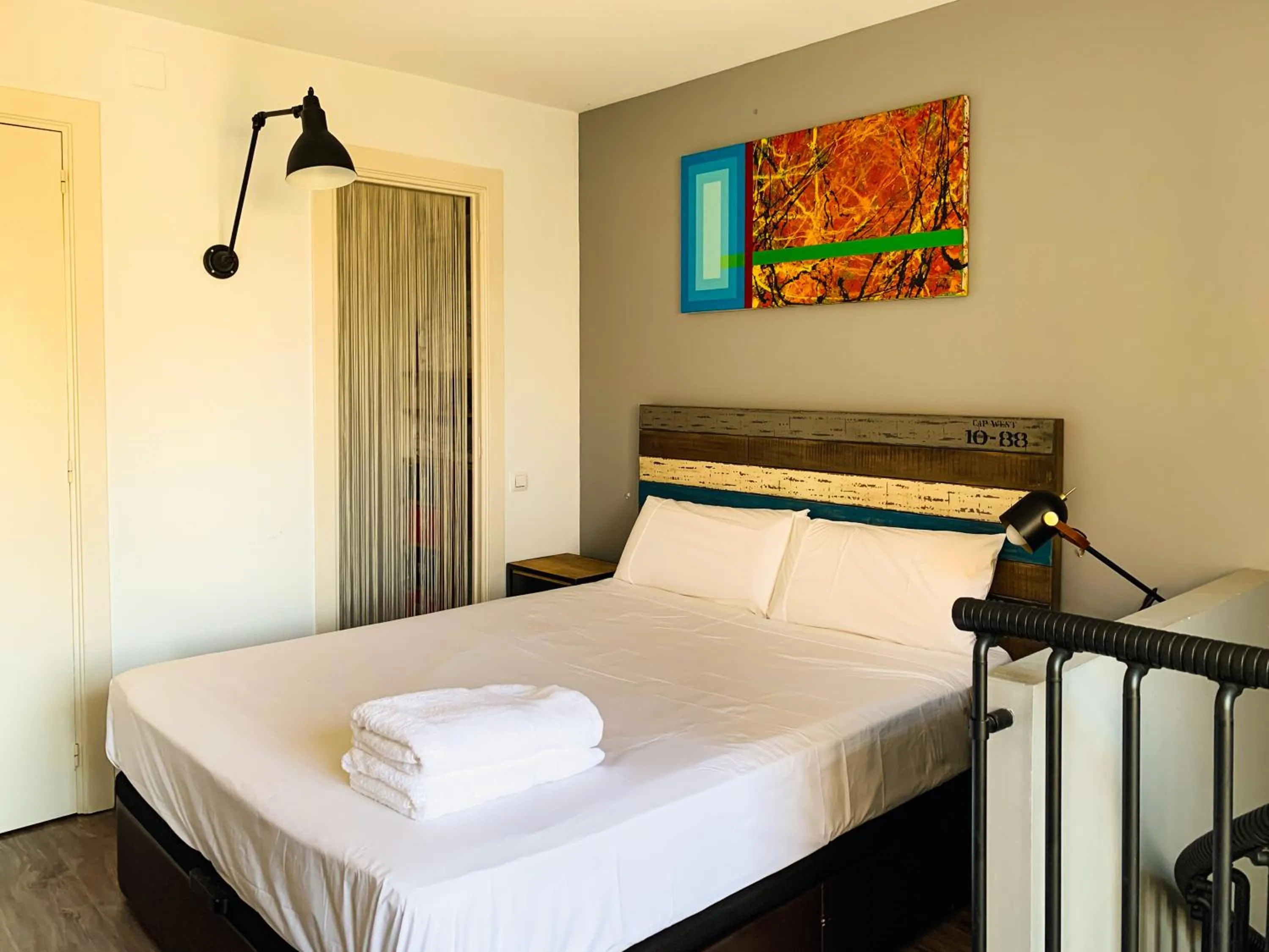 Bed in Incredible 2BR Penthouse with Urban Rooftop Garden