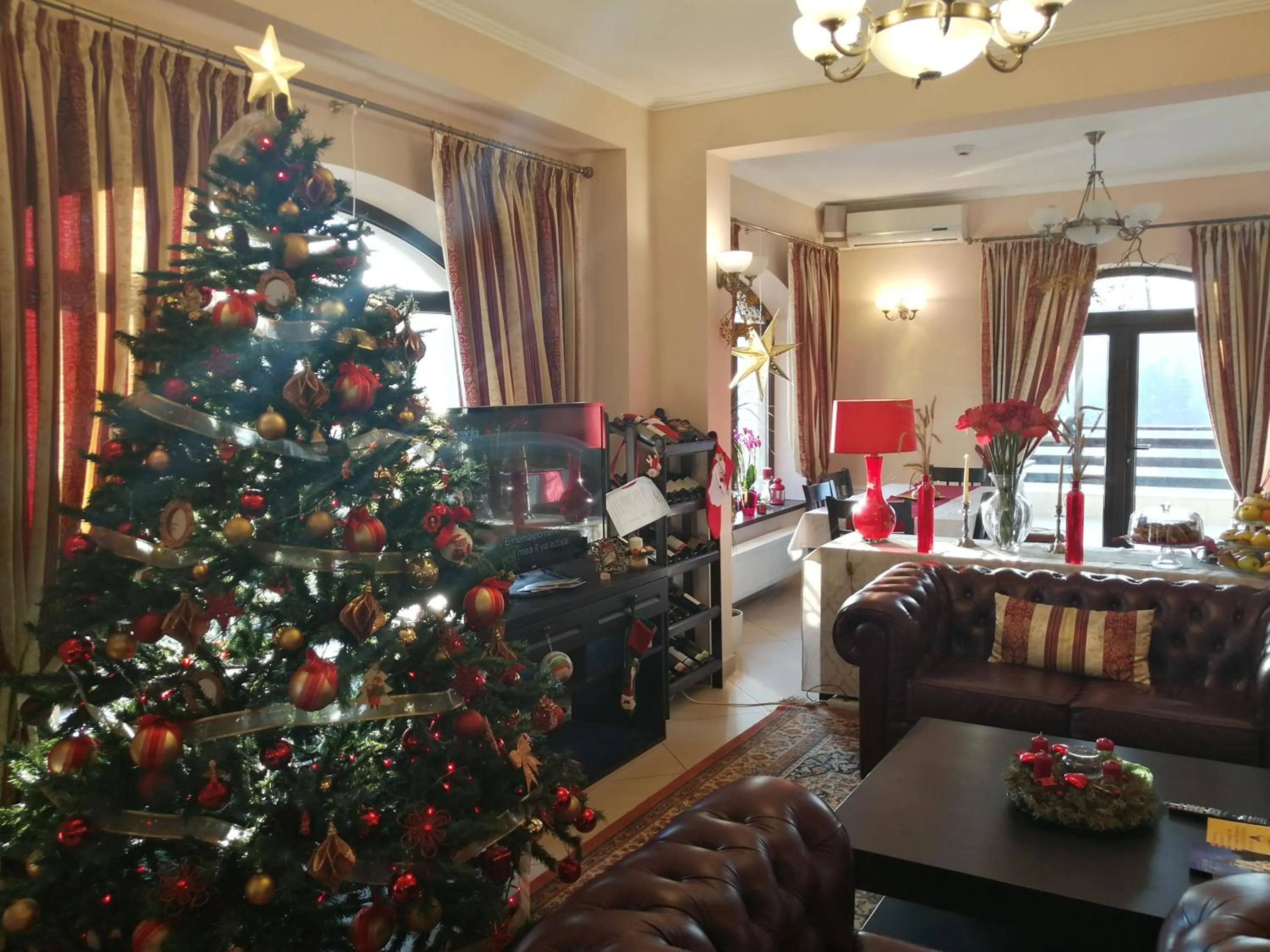 Communal lounge/ TV room in Pensiunea Toscana