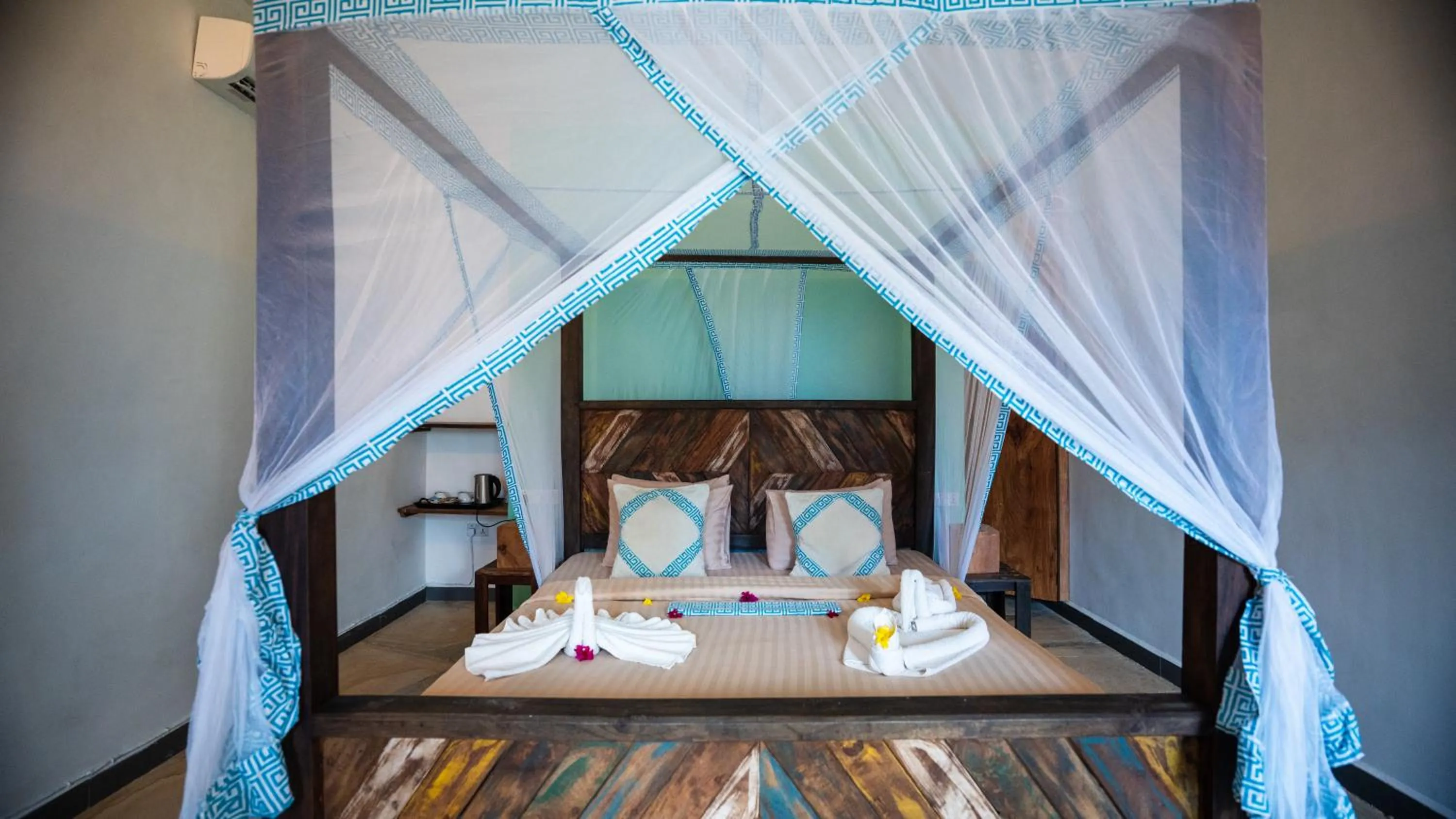 Bed in Reef & Beach Resort - Spa Jambiani