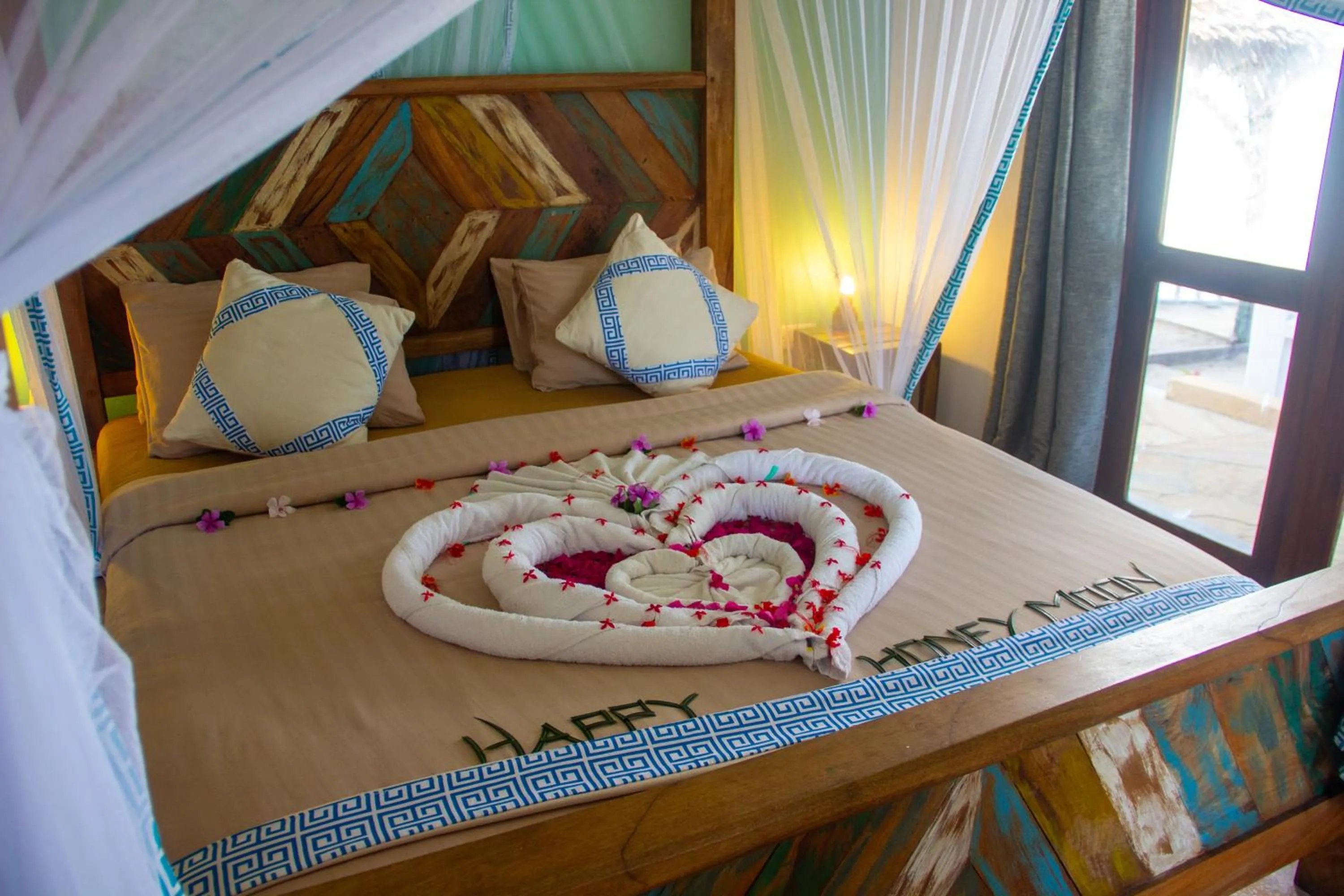 Bed in Reef & Beach Resort - Spa Jambiani