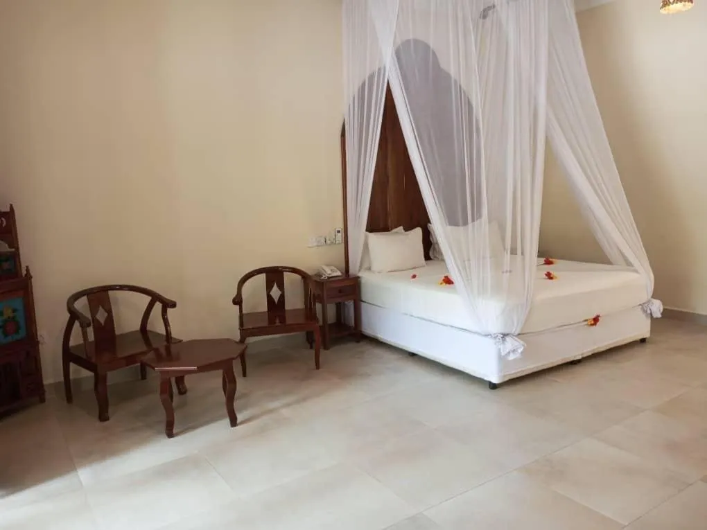 Bedroom, Bed in Sunset Kendwa Beach Hotel