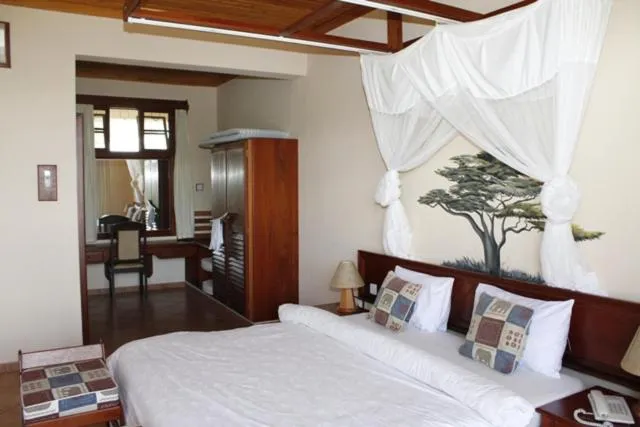 Bed in Ryan's Bay Hotel