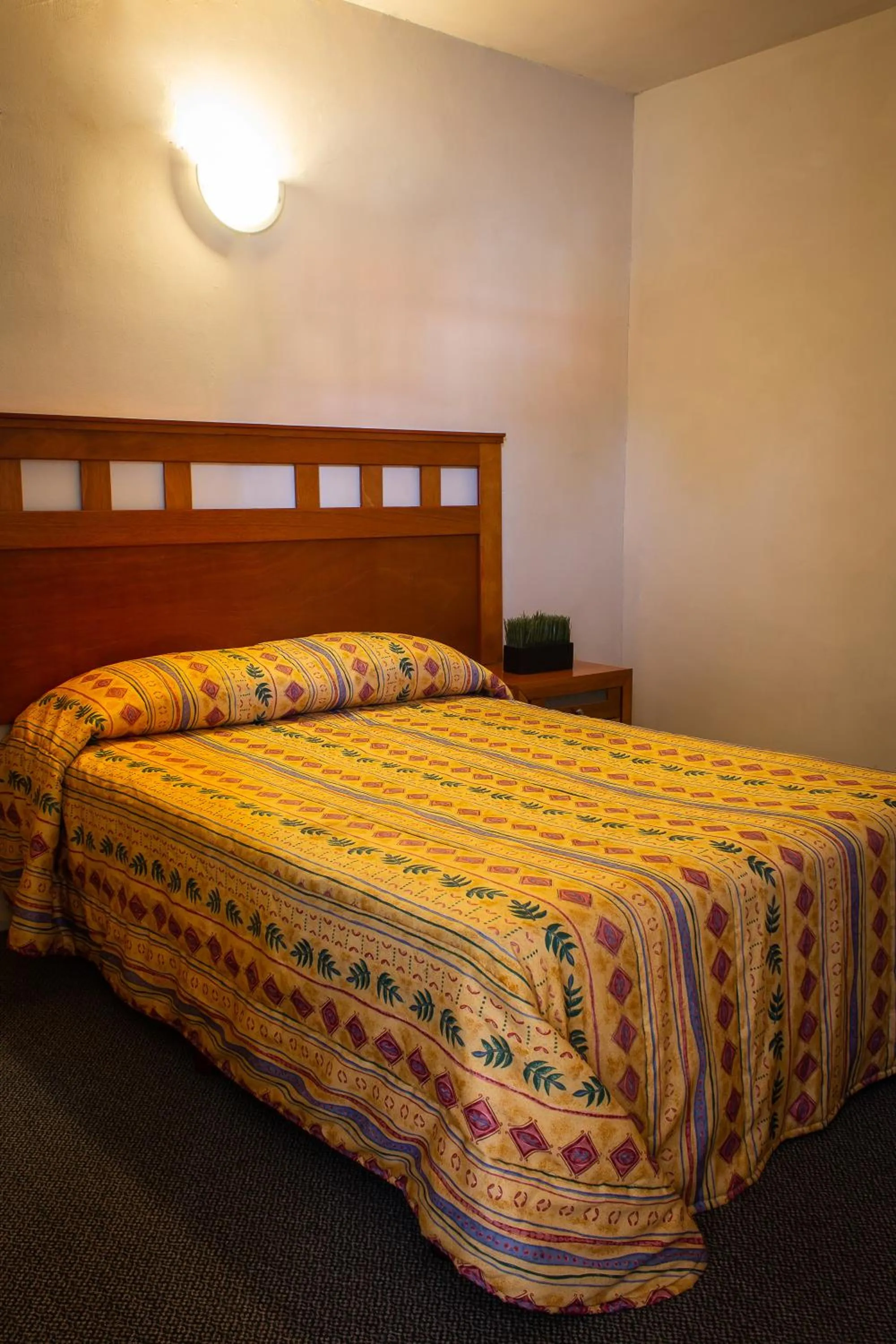 Bed in BONITTO INN® Manuel