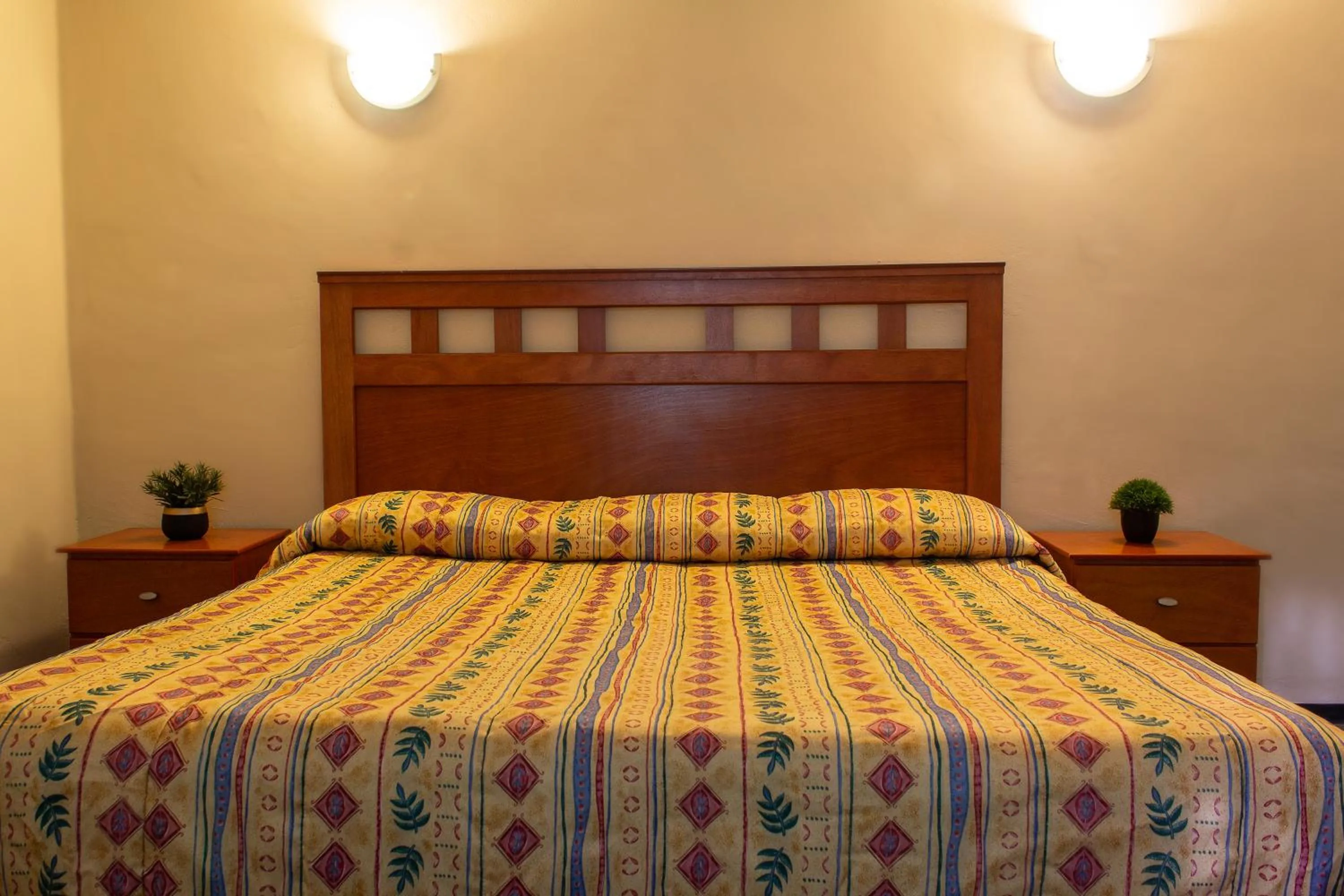 Bed in BONITTO INN® Manuel