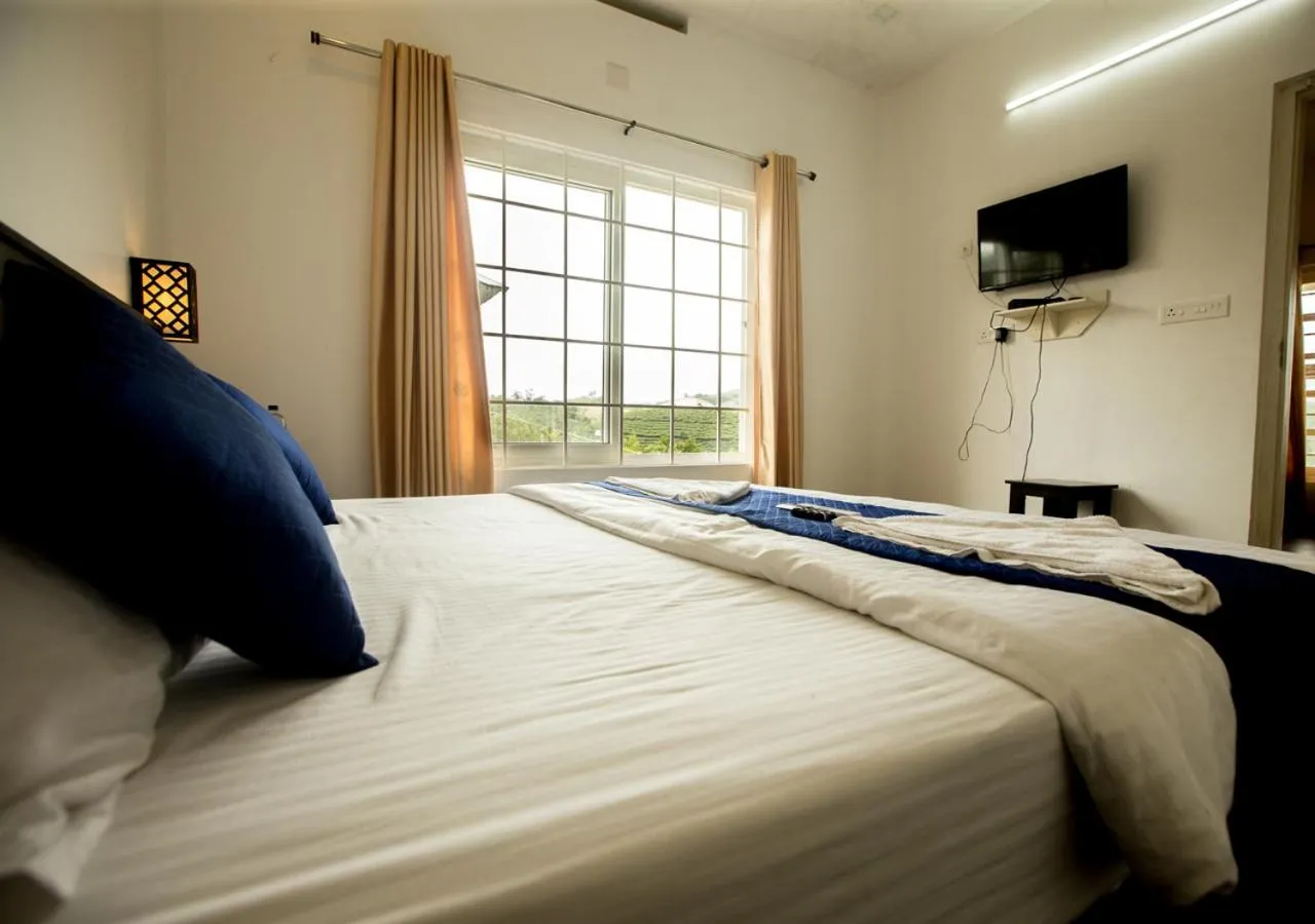 Bedroom, Bed in White Stone Vagamon Hilltop Cottage by VOYE HOMES