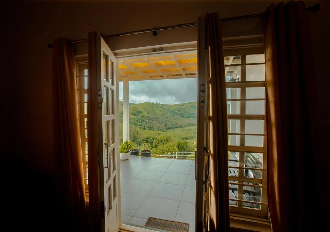 Day in White Stone Vagamon Hilltop Cottage by VOYE HOMES