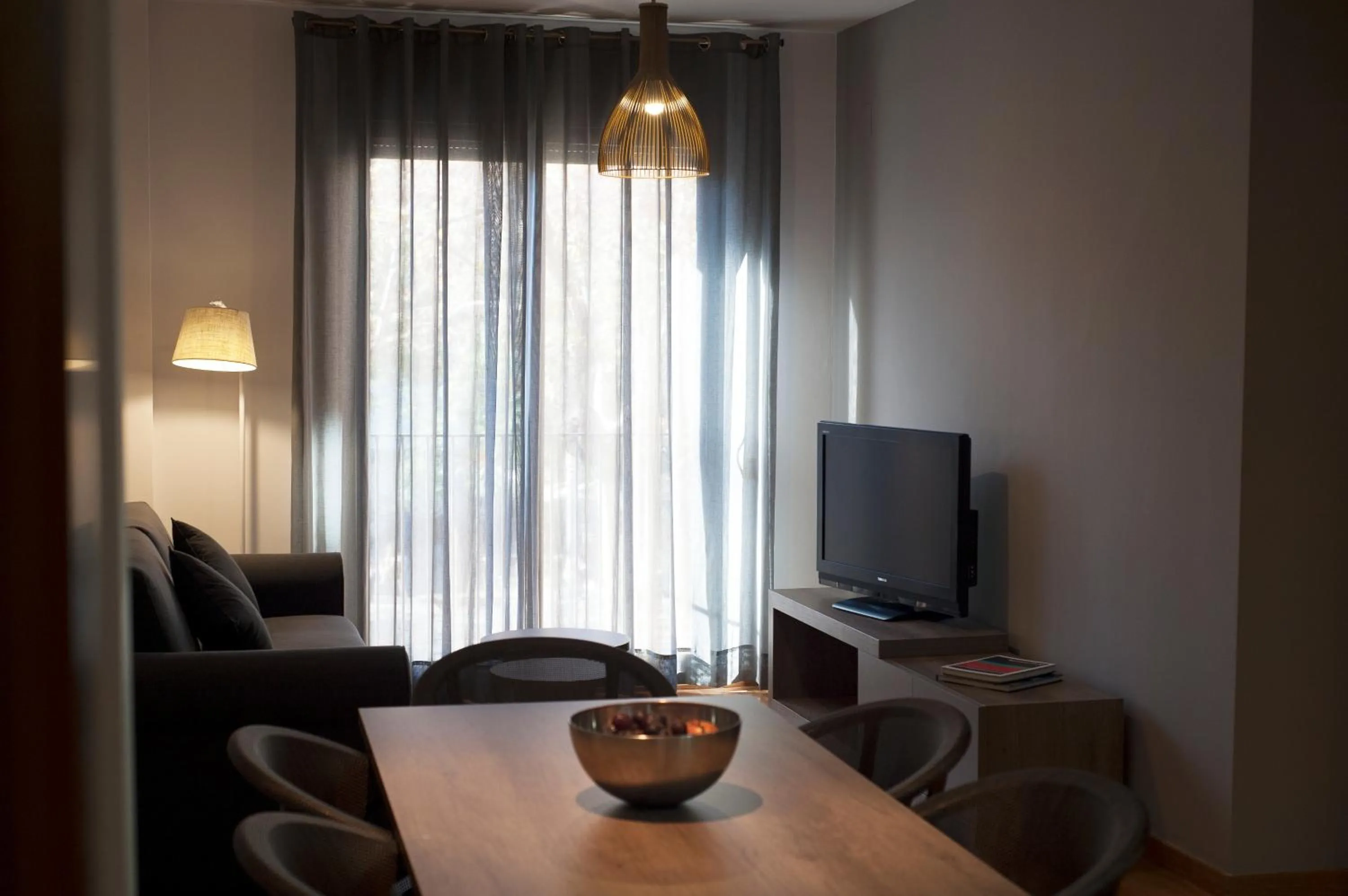 Seating area in MH Apartments Gracia
