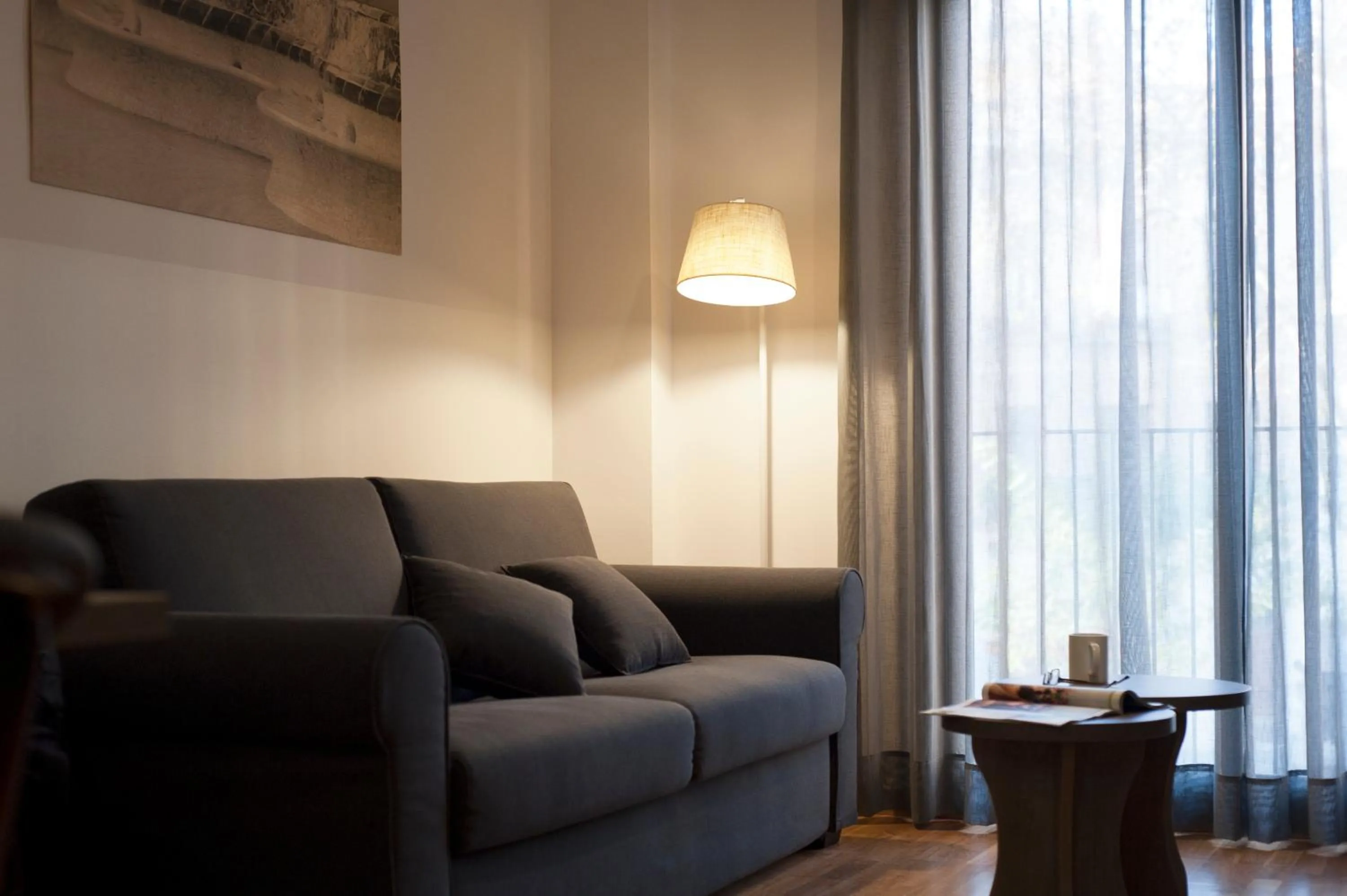 Seating area in MH Apartments Gracia