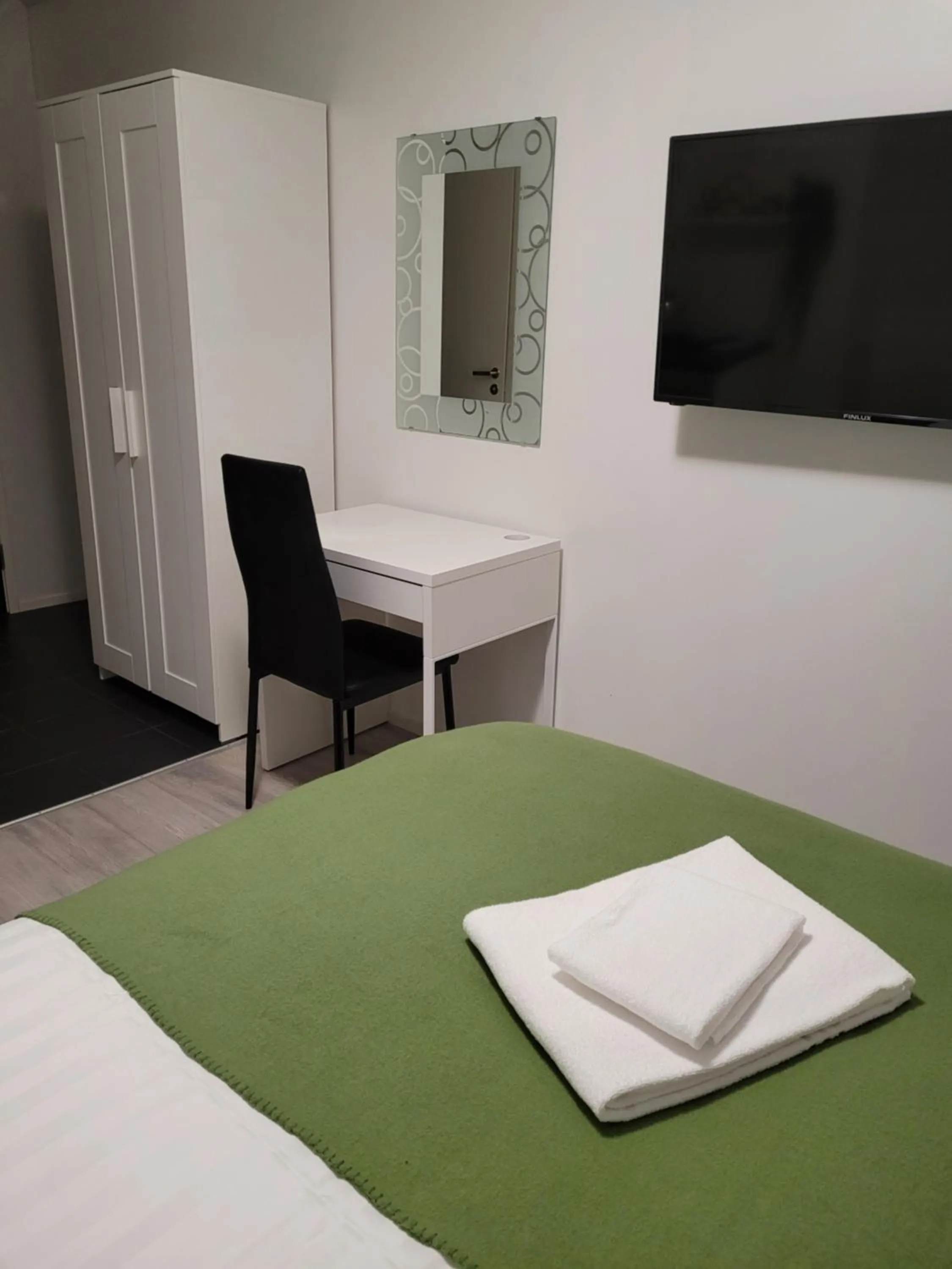 Photo of the whole room, Bed in Hotelli Salpakangas