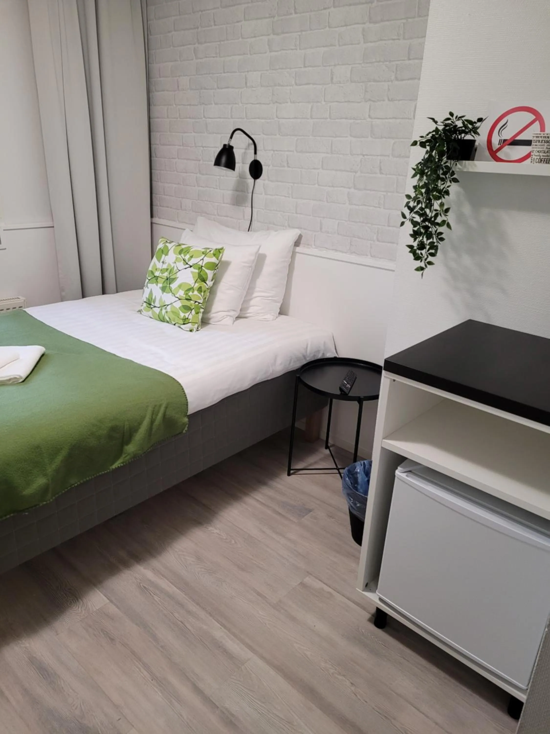 Photo of the whole room, Bed in Hotelli Salpakangas