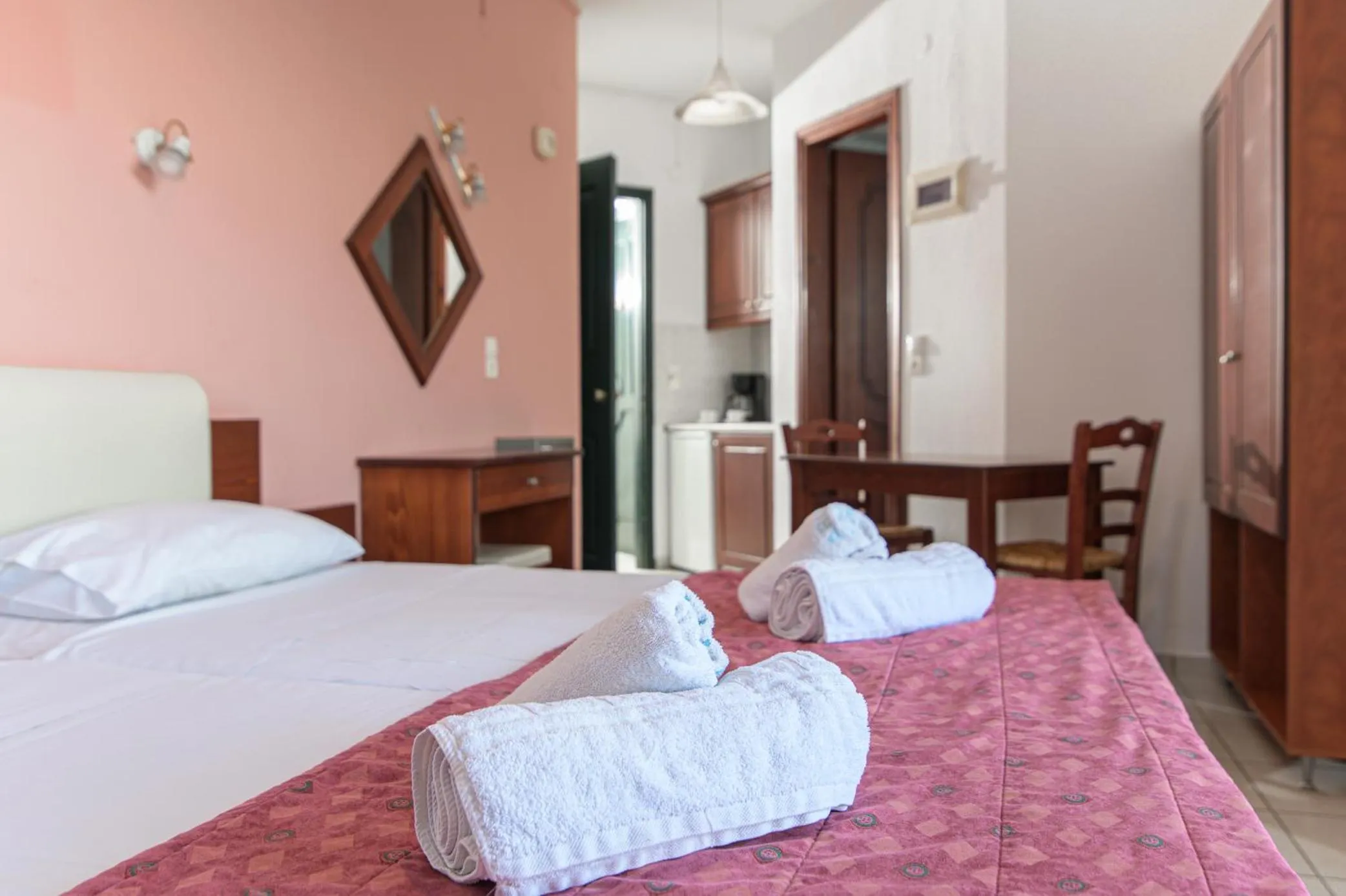 Bed in Ariadni Palace Apartments
