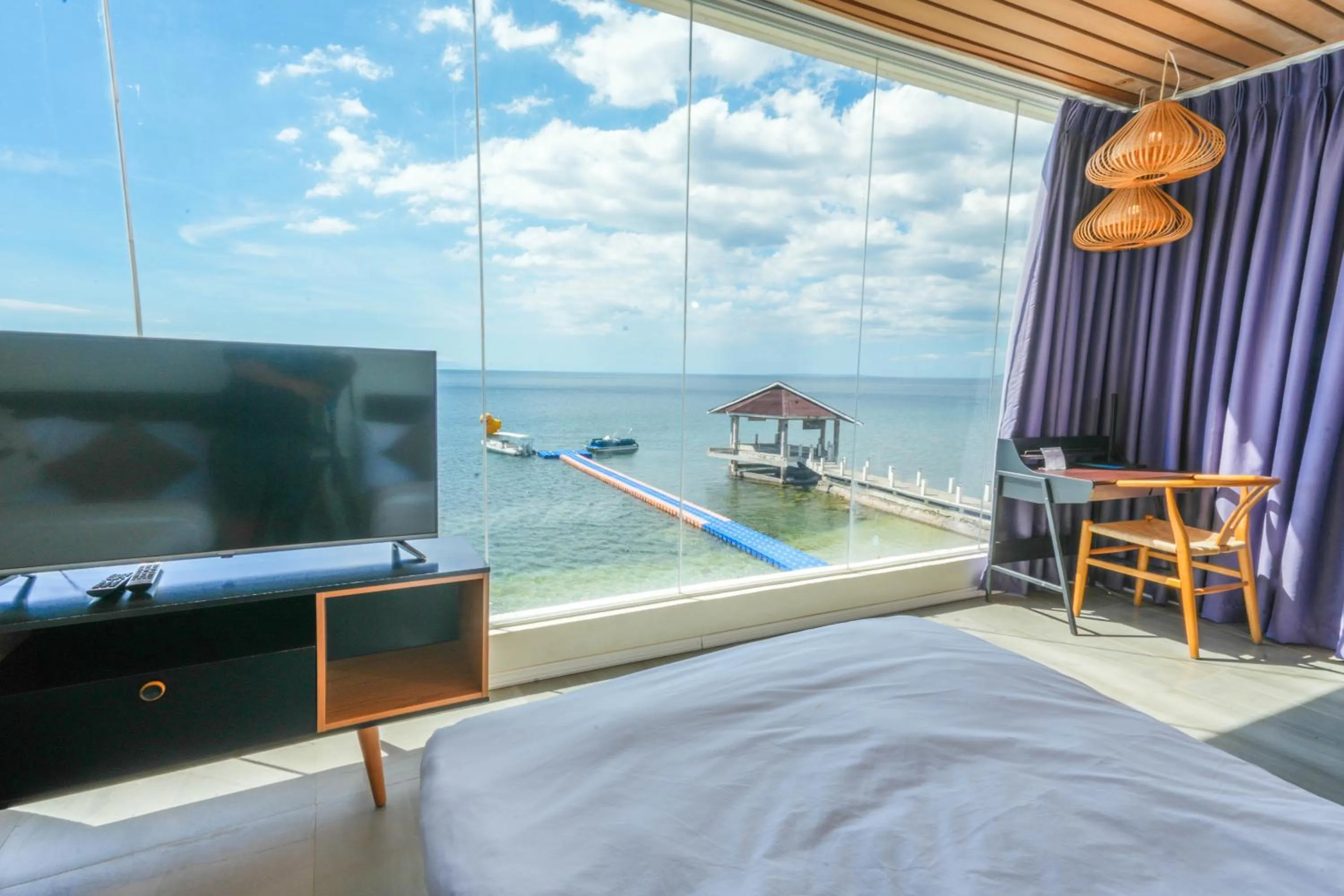 Bed in Destino Beach Resort and Hotel