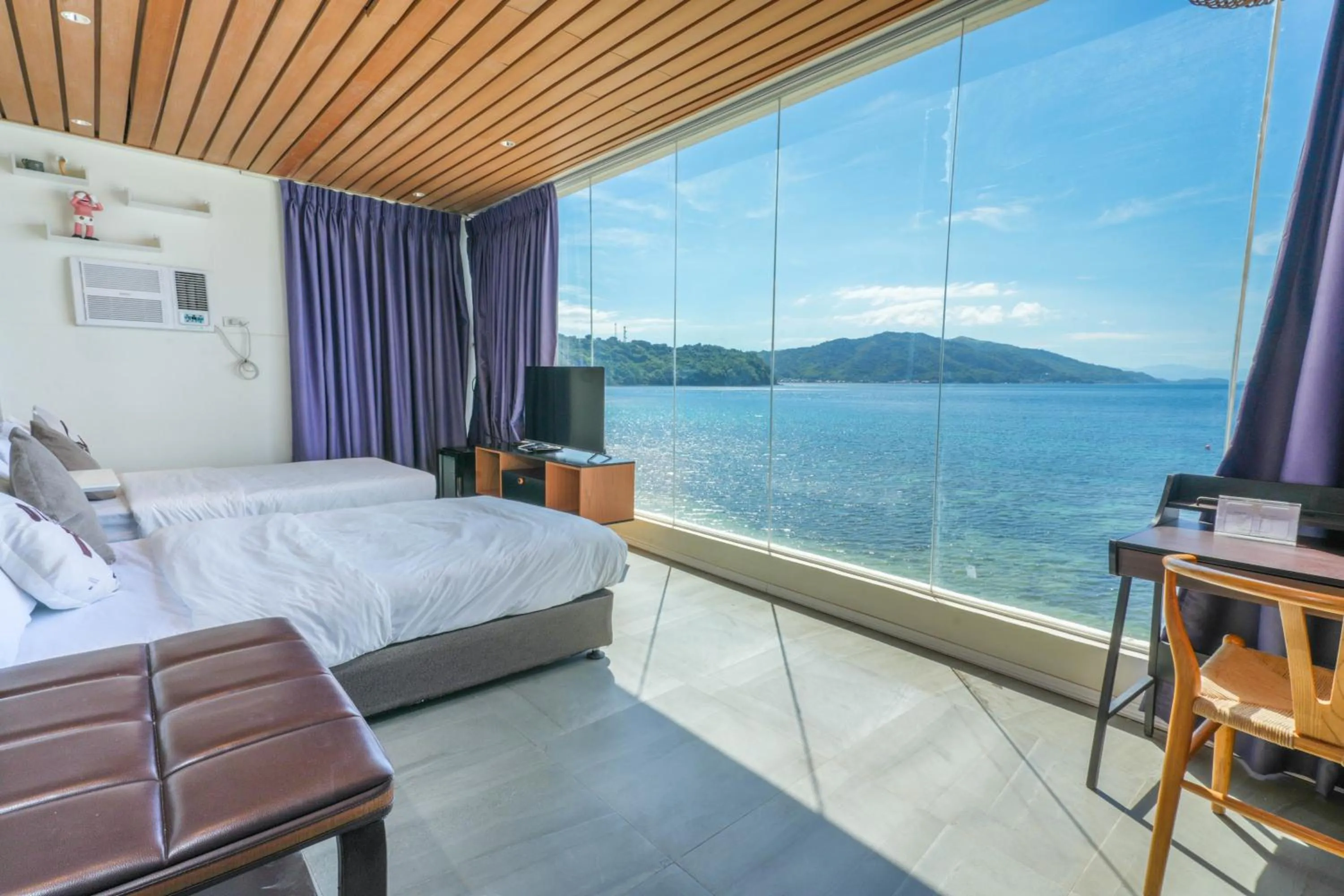 Bed in Destino Beach Resort and Hotel