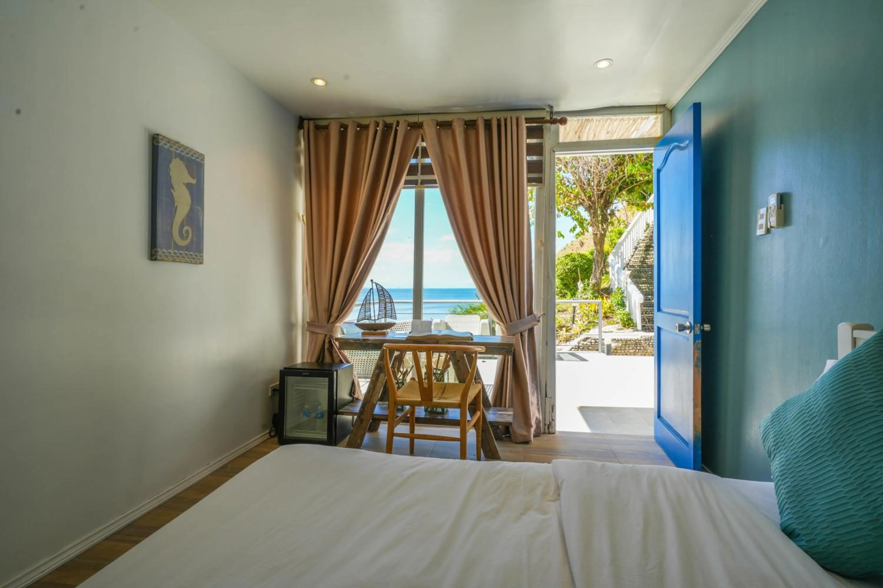 Bed in Destino Beach Resort and Hotel