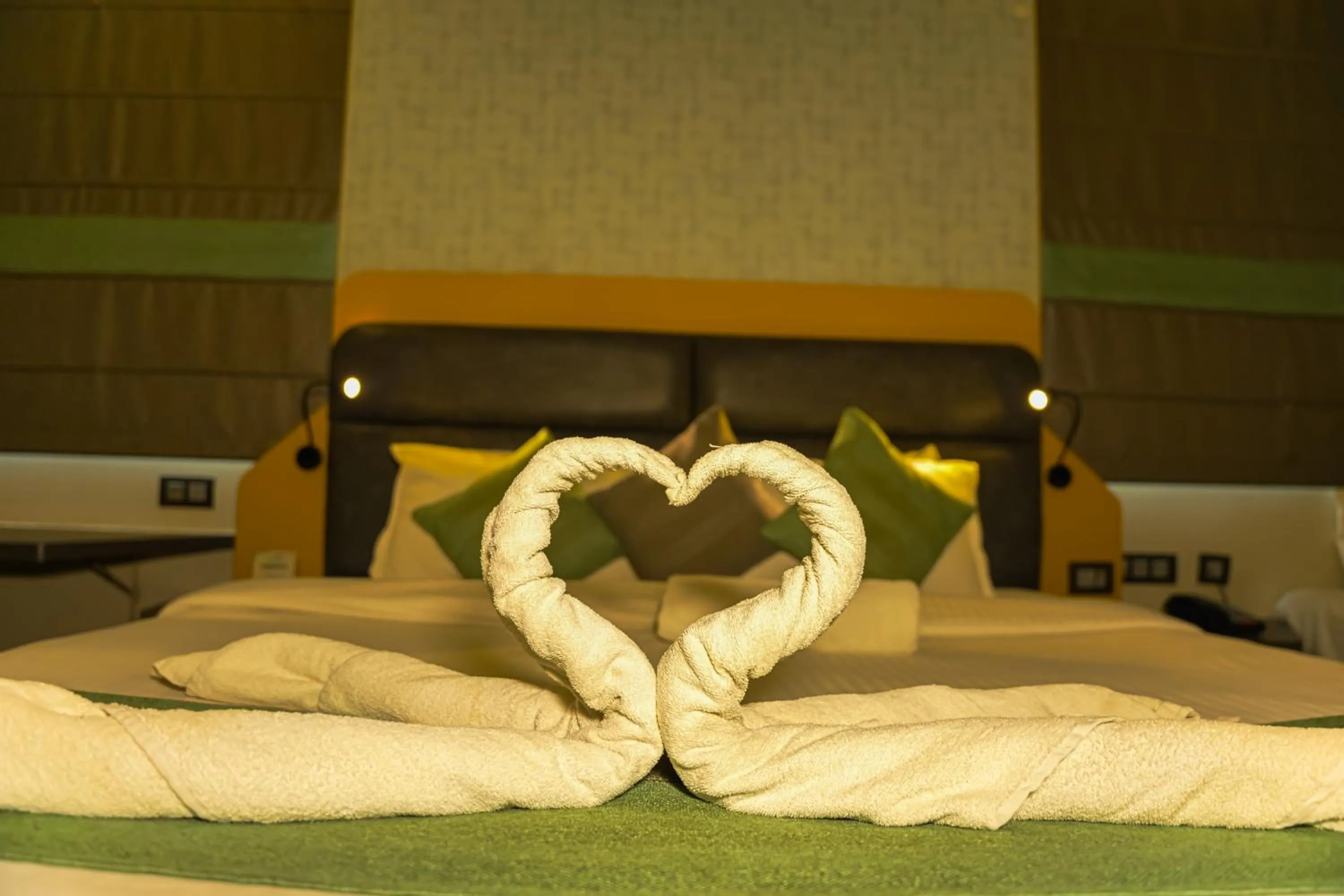 Bed in THE CENT HOTEL