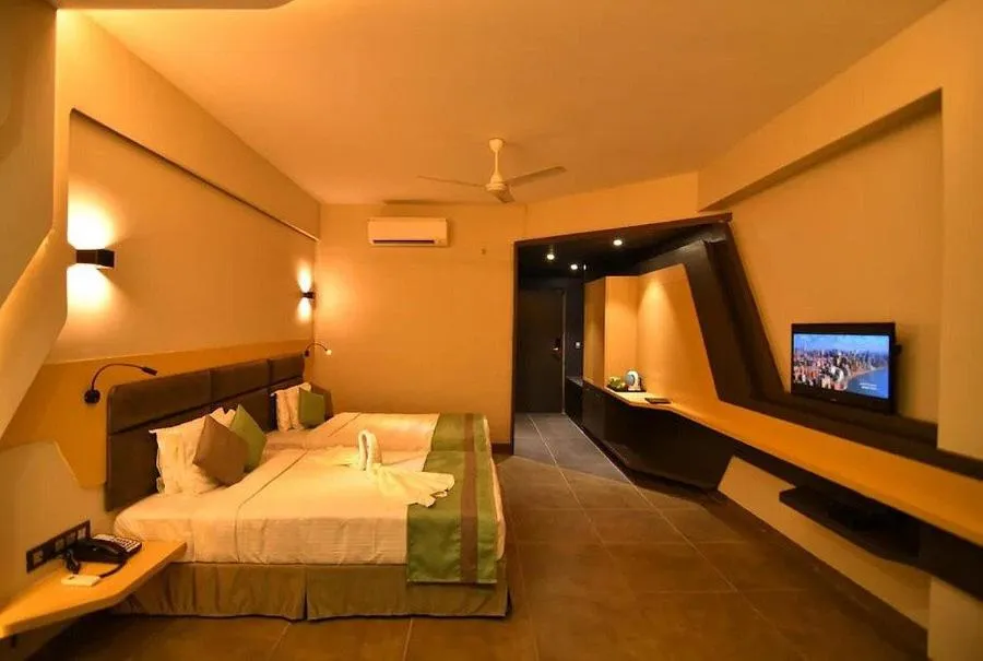 Bed in THE CENT HOTEL