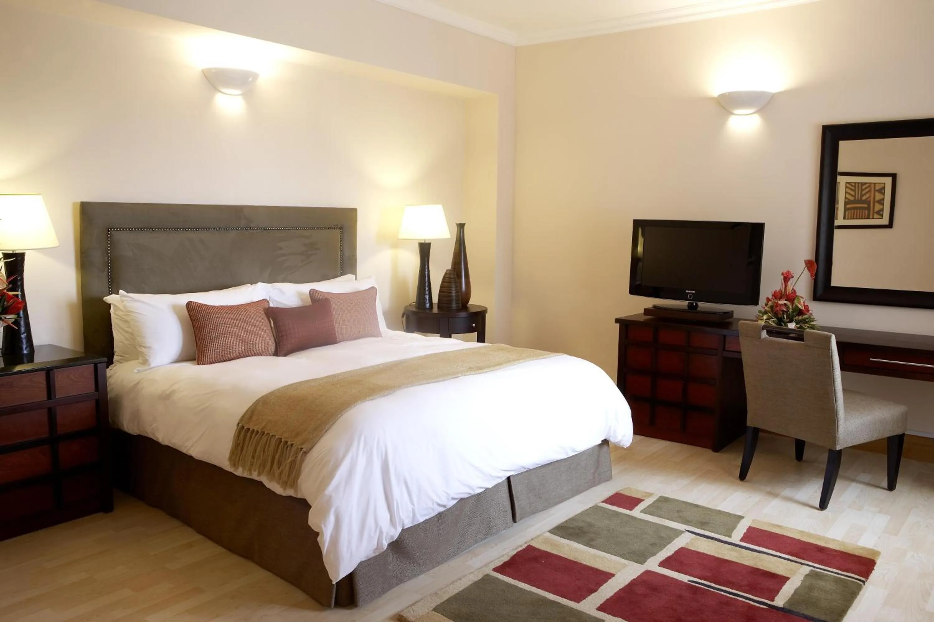 Bed in The Federal Palace Hotel and Casino