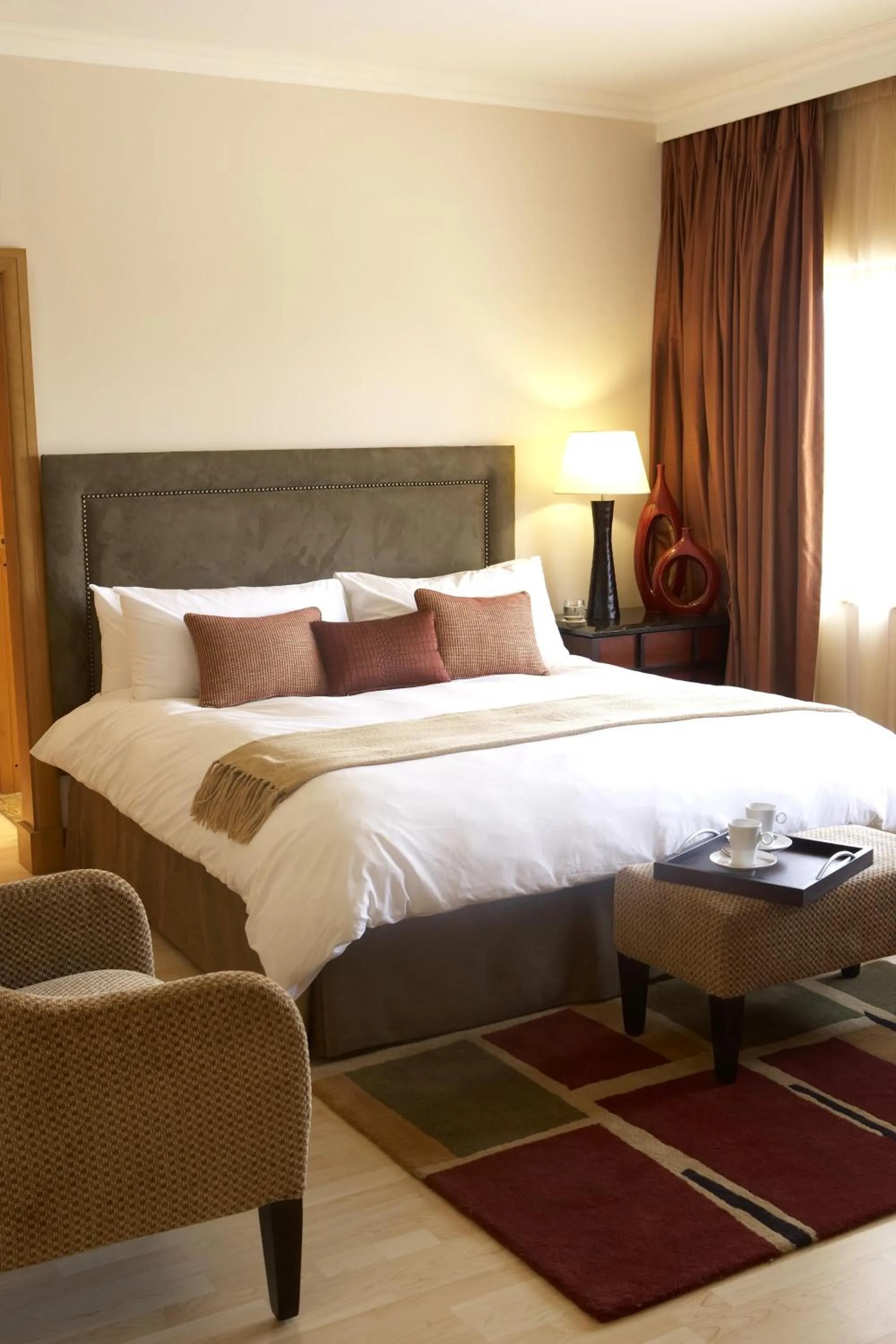 Bed in The Federal Palace Hotel and Casino