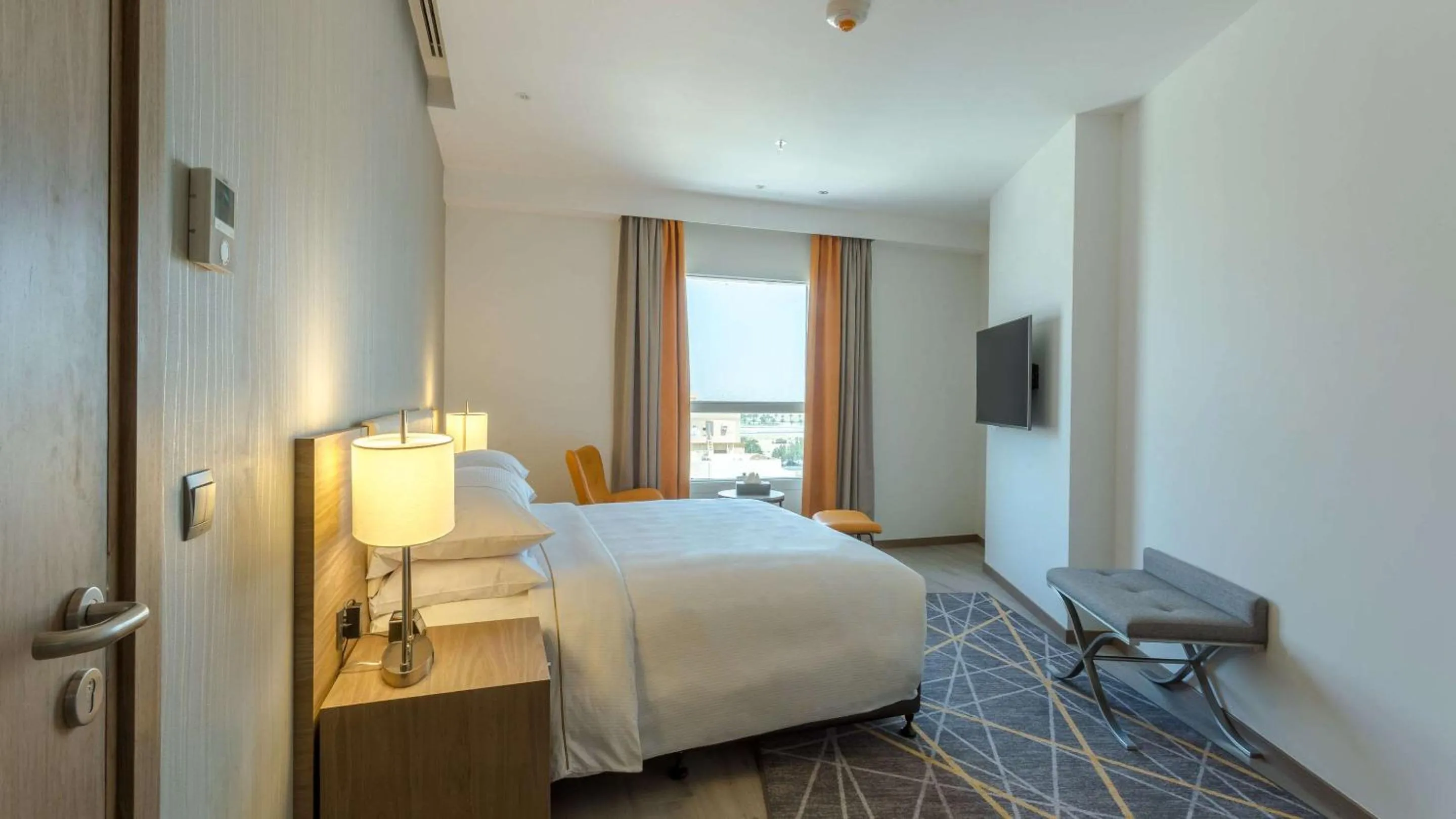 Photo of the whole room, Bed in Clarion Hotel Jeddah Airport