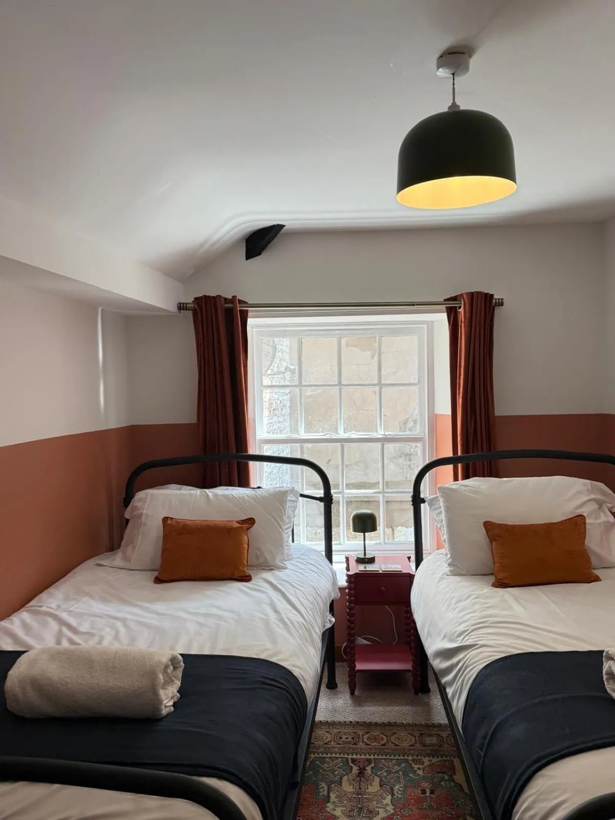 Bed in Bow Alley Lodge