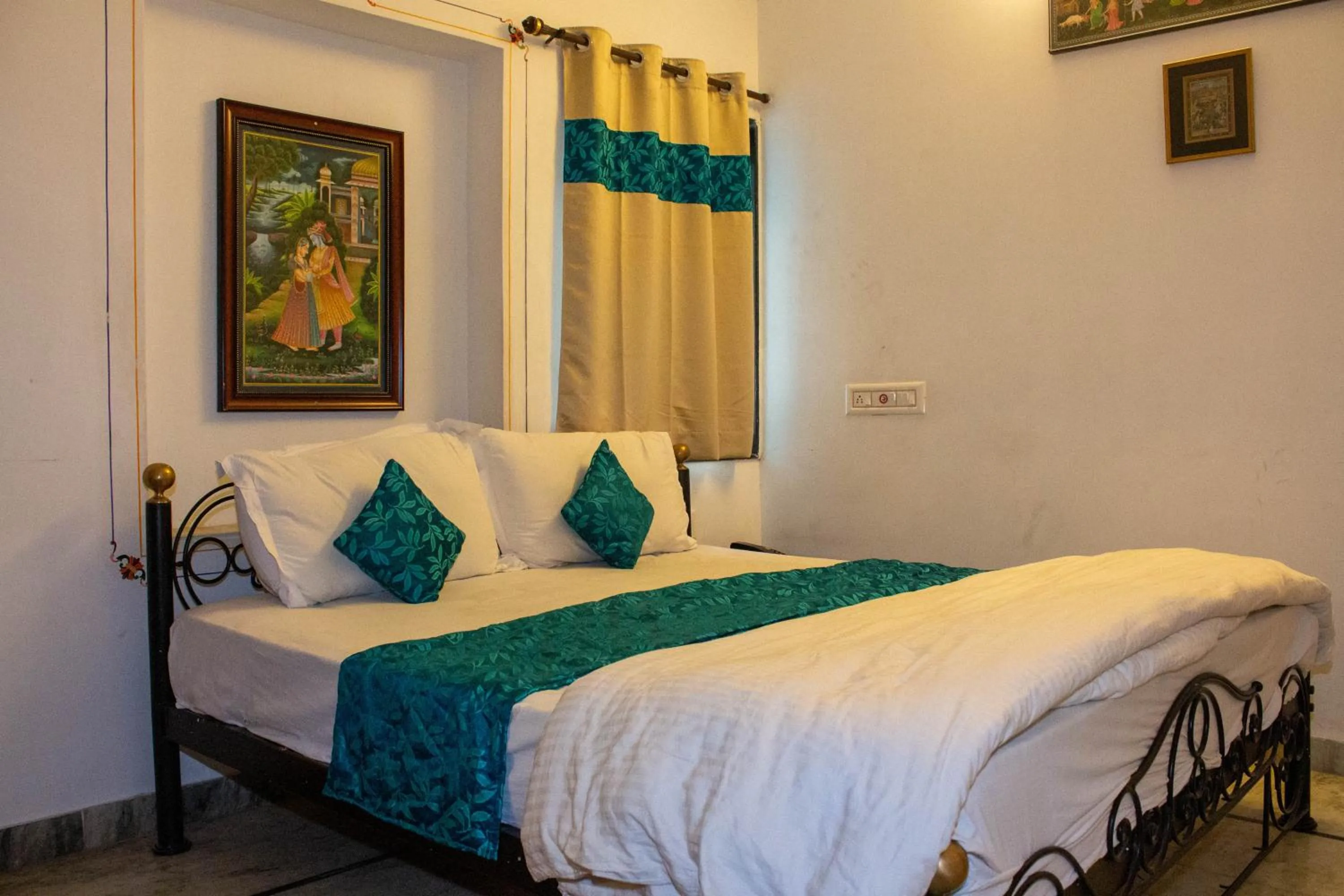 Bed in Baba Palace - A Heritage Hotel, Udaipur