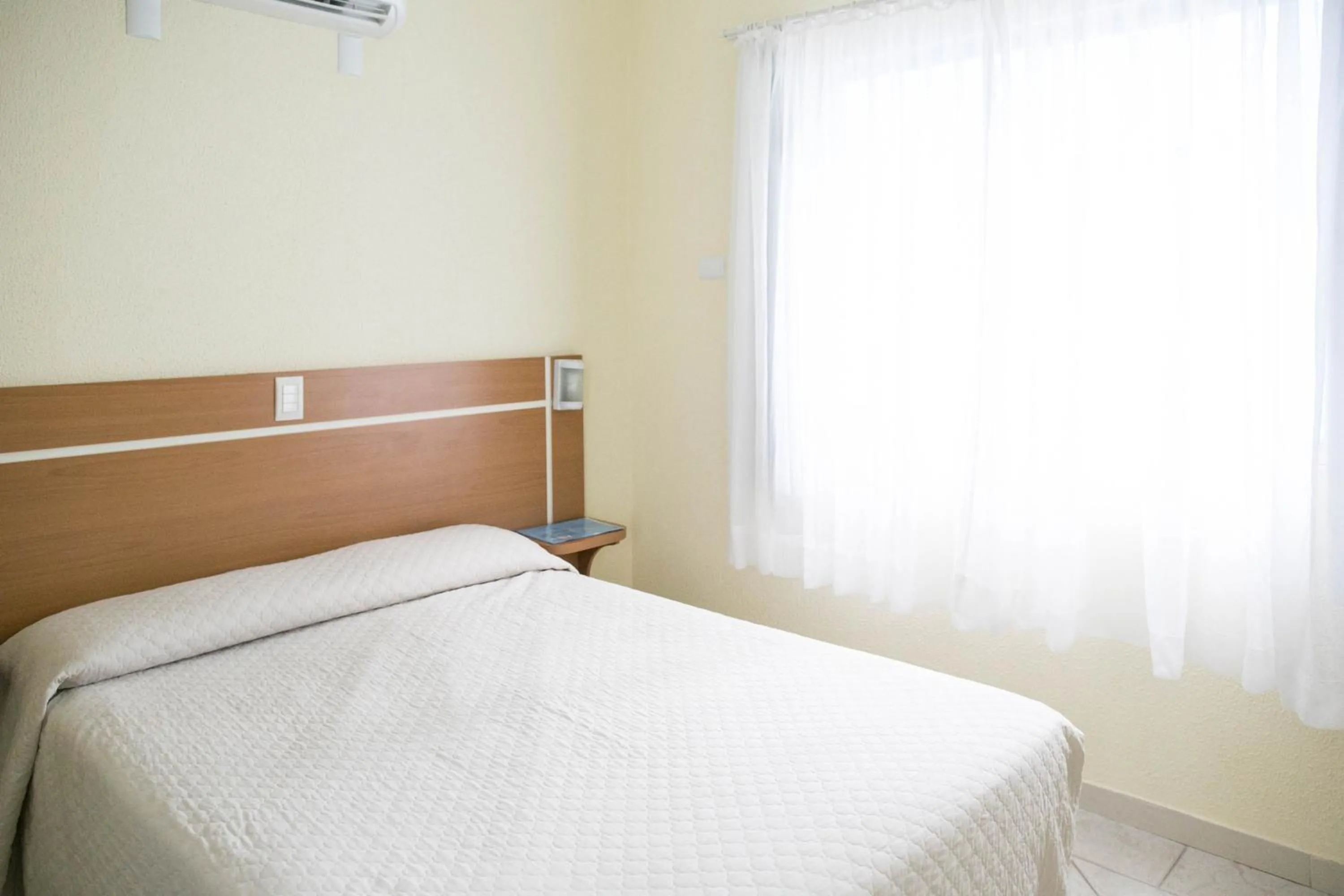 Bed in Bombinhas Praia Apart Hotel - Unidade rua Corrupião