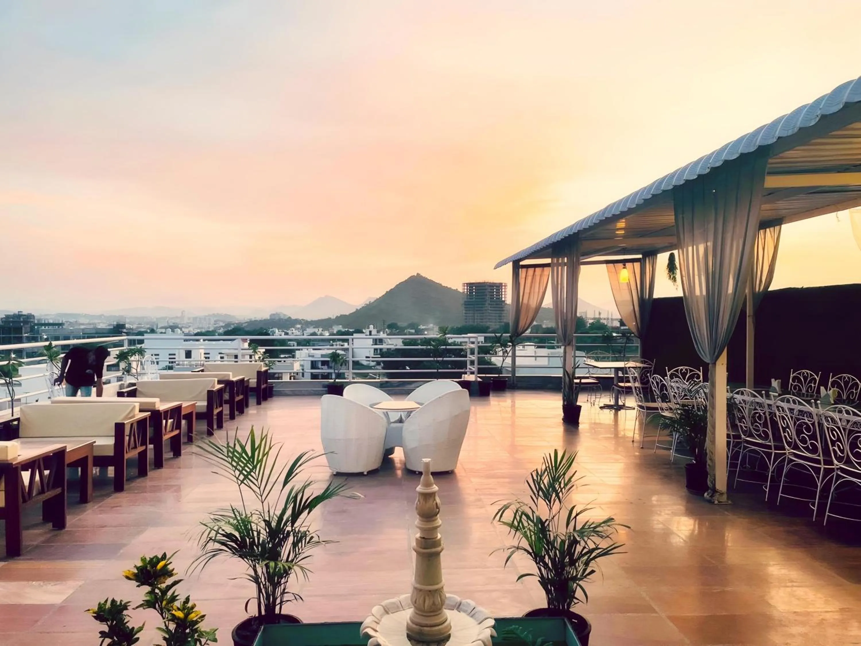 Restaurant/places to eat in HOTEL THE CELEBRATION BY AMOD Best Hotel & Rooftop