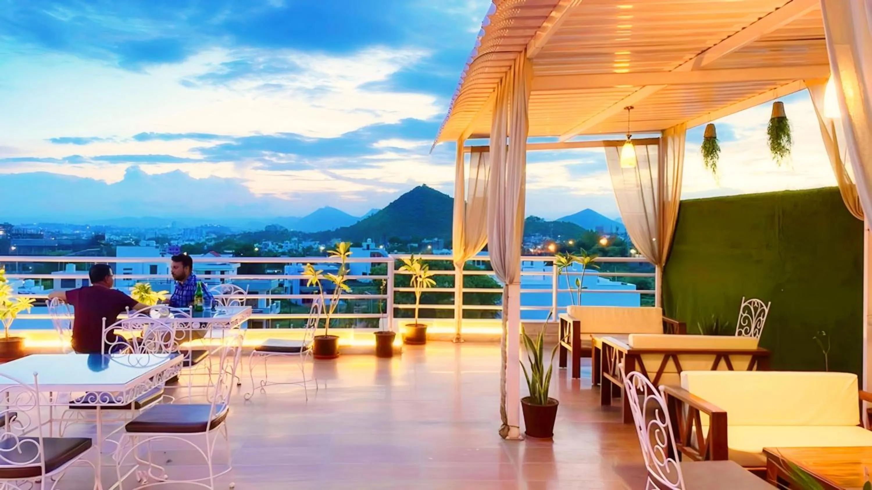 Restaurant/places to eat in HOTEL THE CELEBRATION BY AMOD Best Hotel & Rooftop