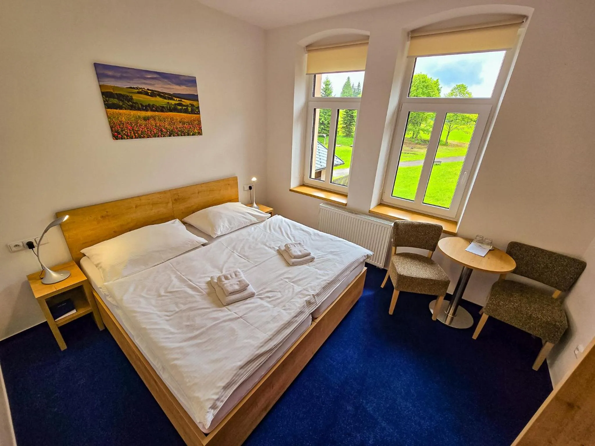 Bed in Hotel Poutní Dům