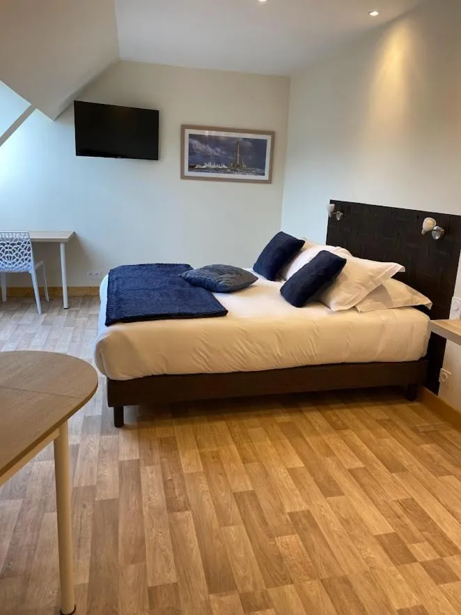 Bed in Le Rocher Appart Hôtel