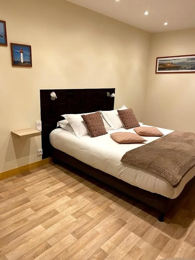 Bed in Le Rocher Appart Hôtel