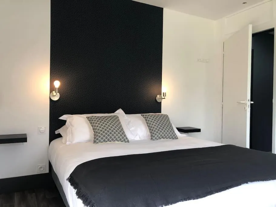 Bed in Le Rocher Appart Hôtel