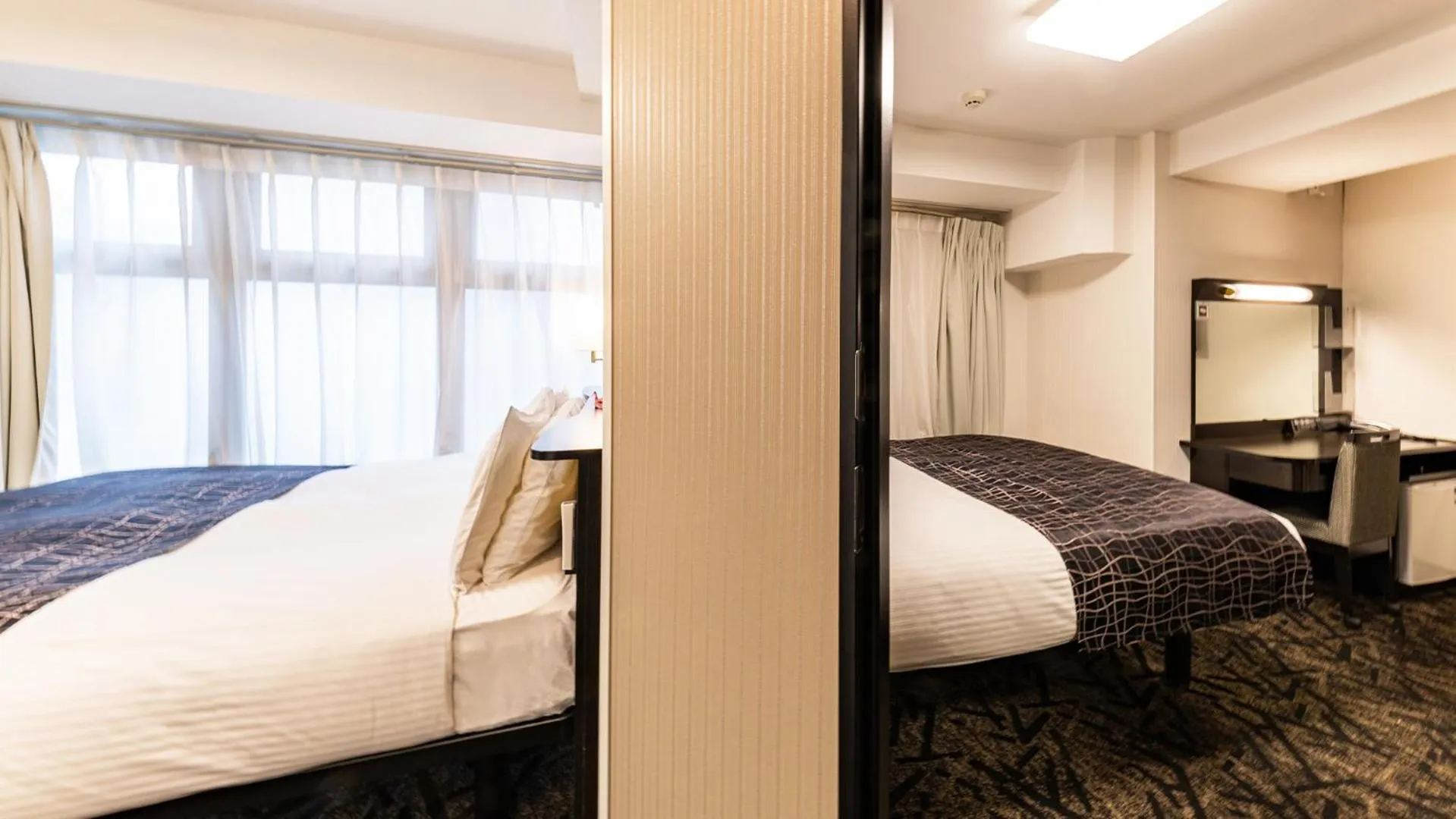 Bed in APA Hotel Nambaminami Daikokucho Ekimae