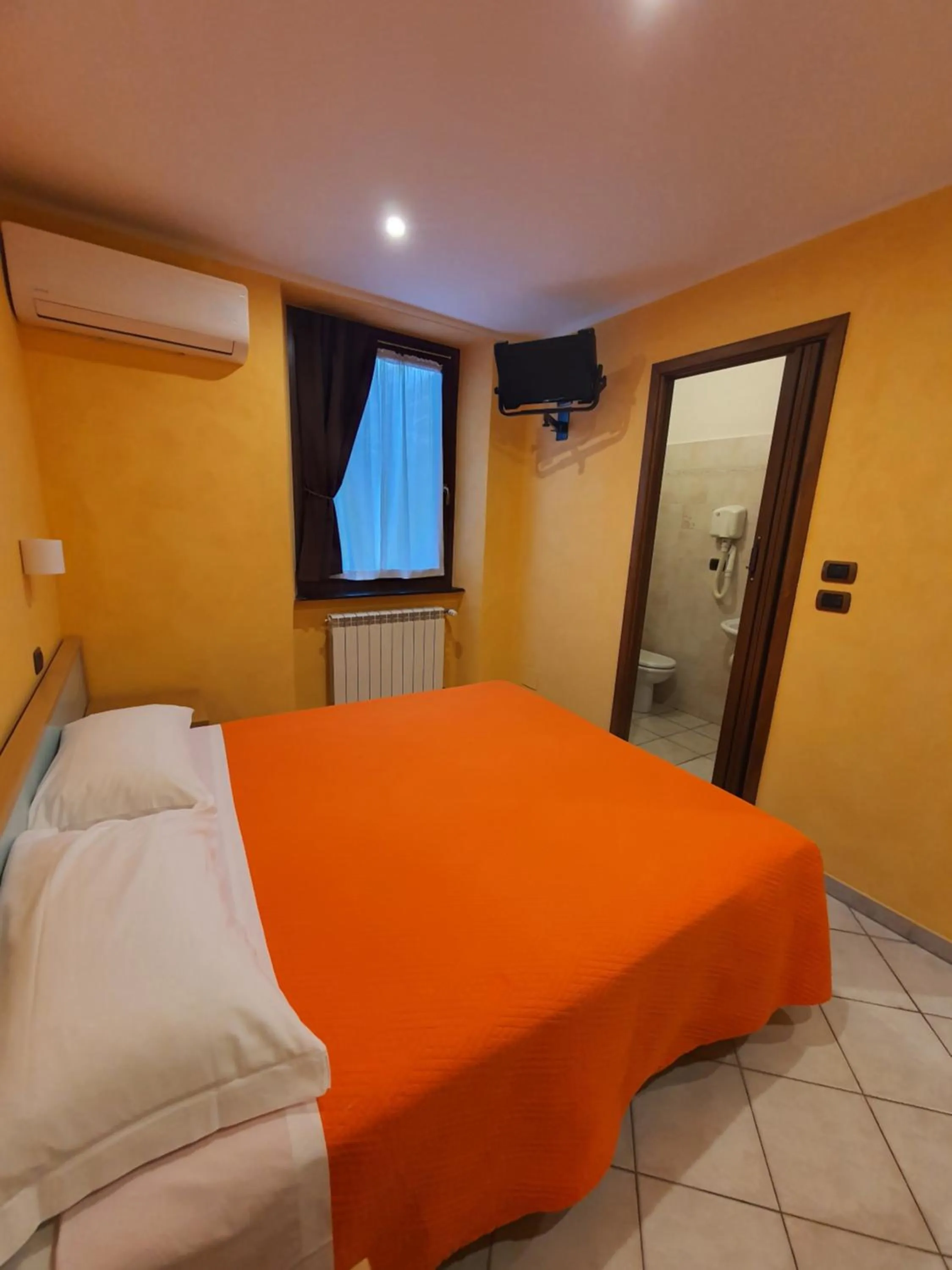 Bed in Hotel Isolabella