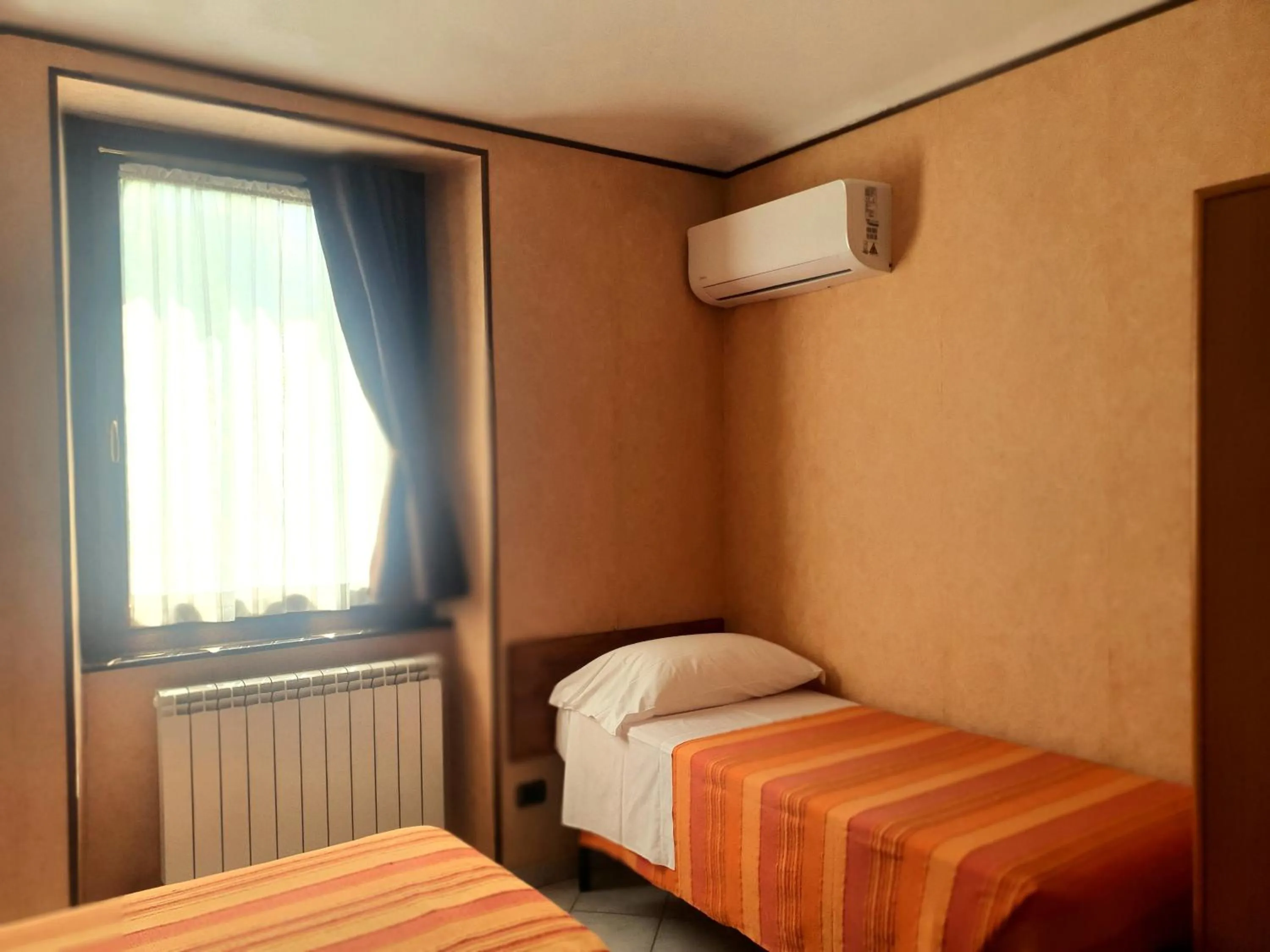 Bed in Hotel Isolabella