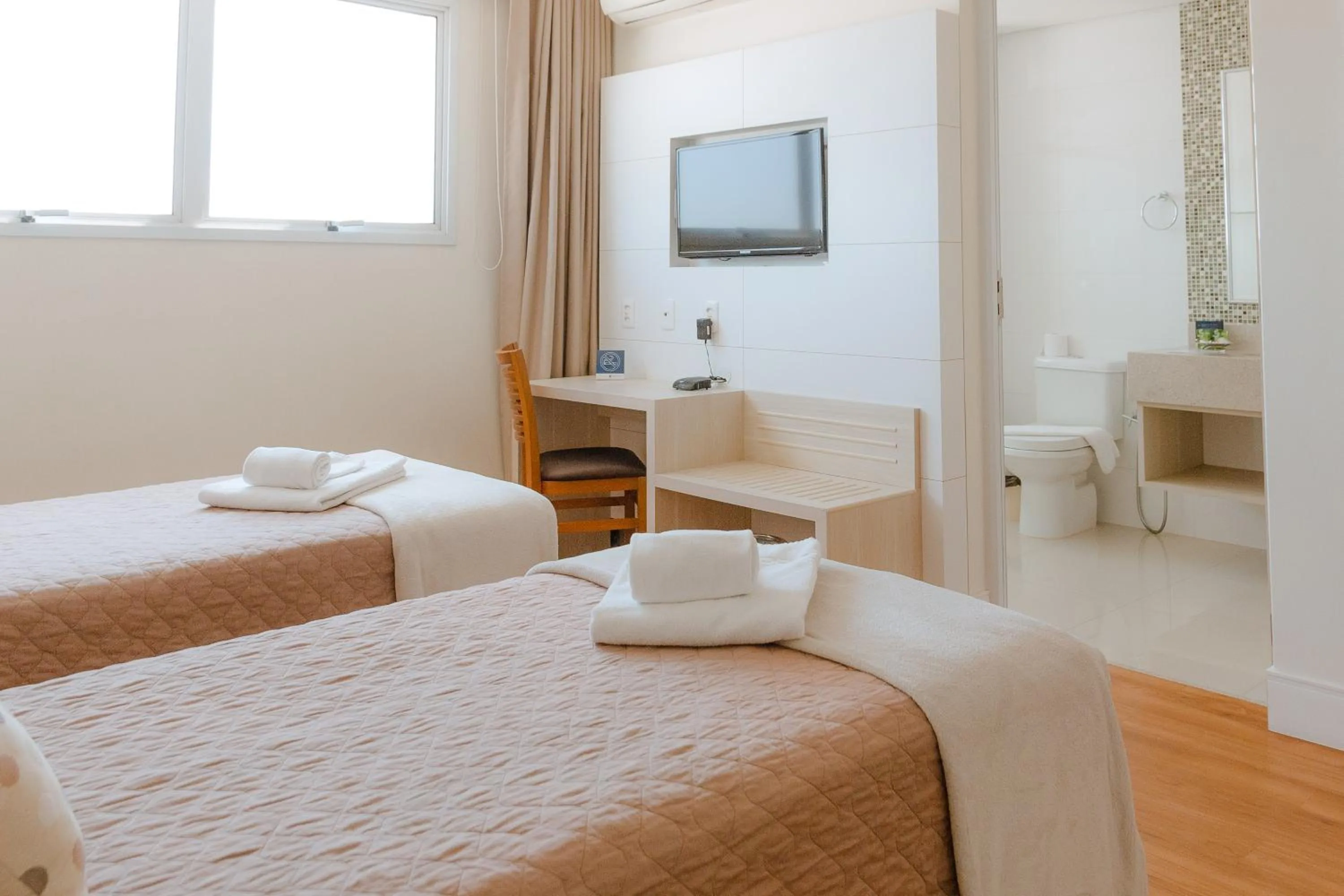 Bed in Porto Feliz Executive Hotel