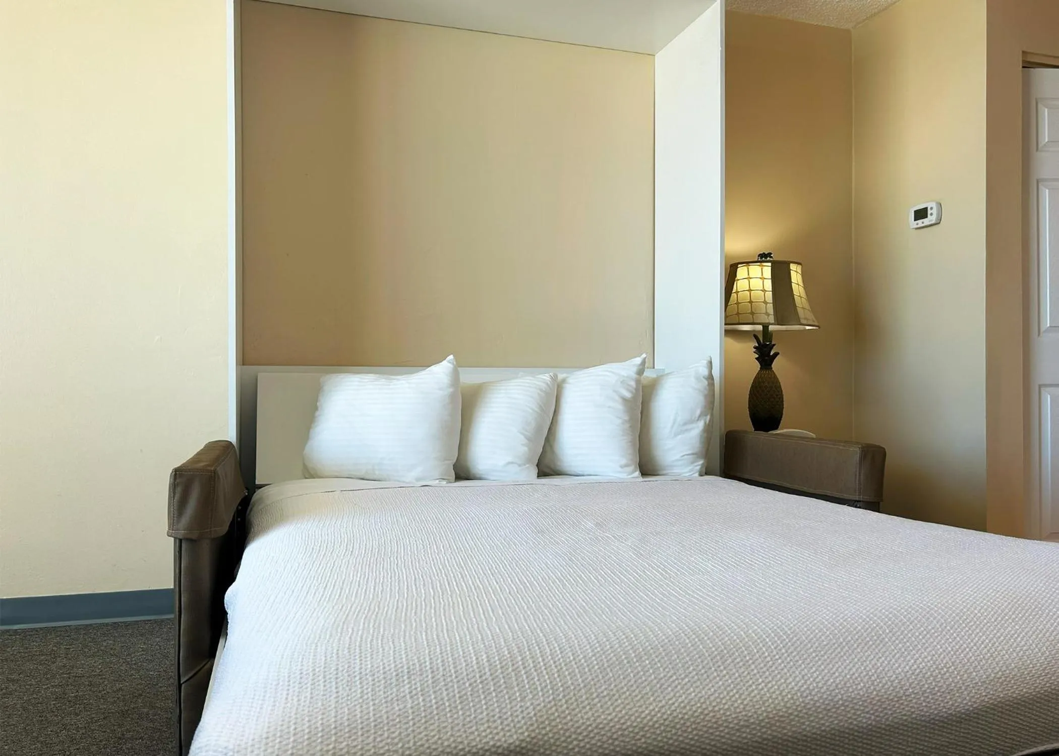 Bed in Outrigger Beach Club Resort