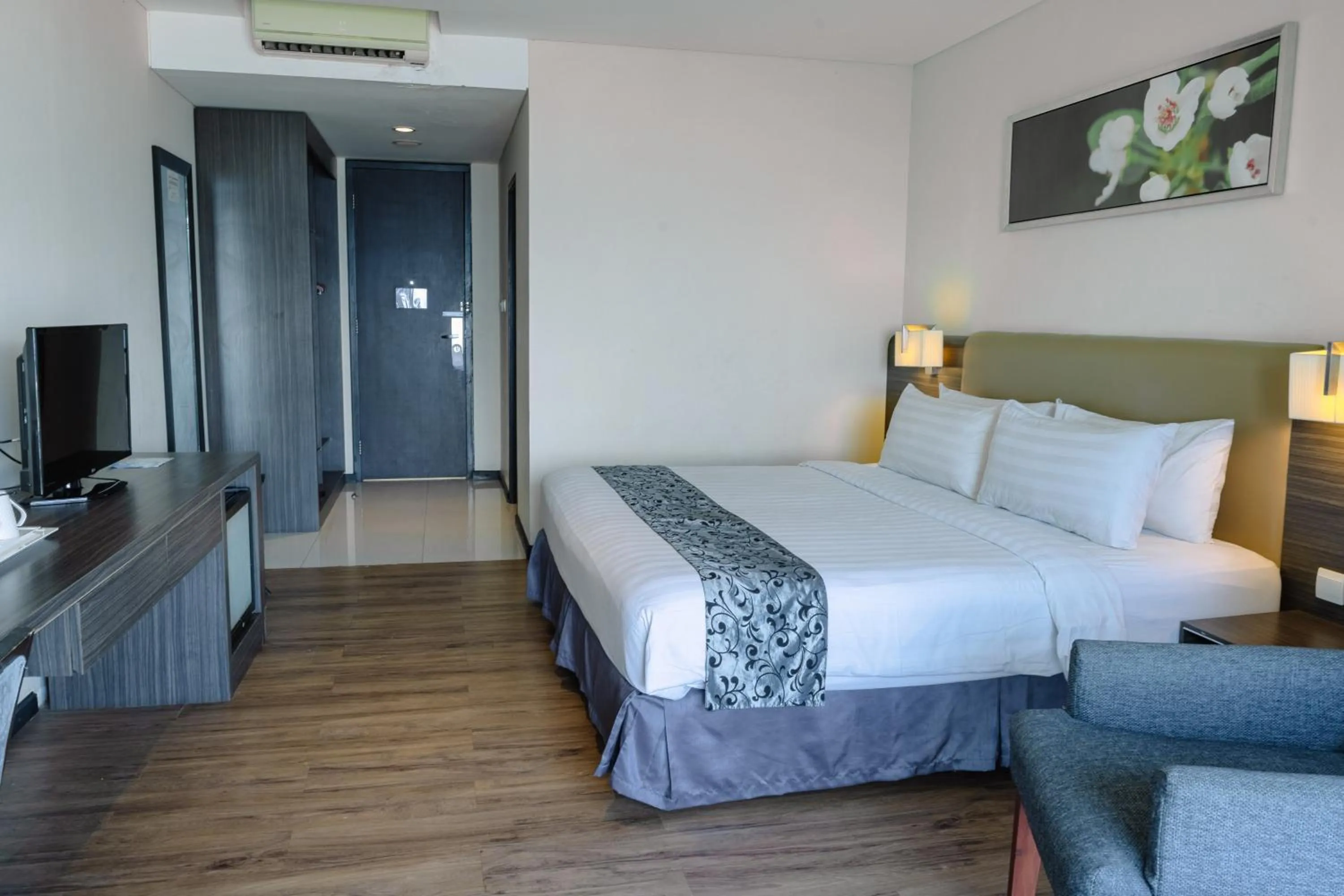 Bed in Estrella Hotel & Conference