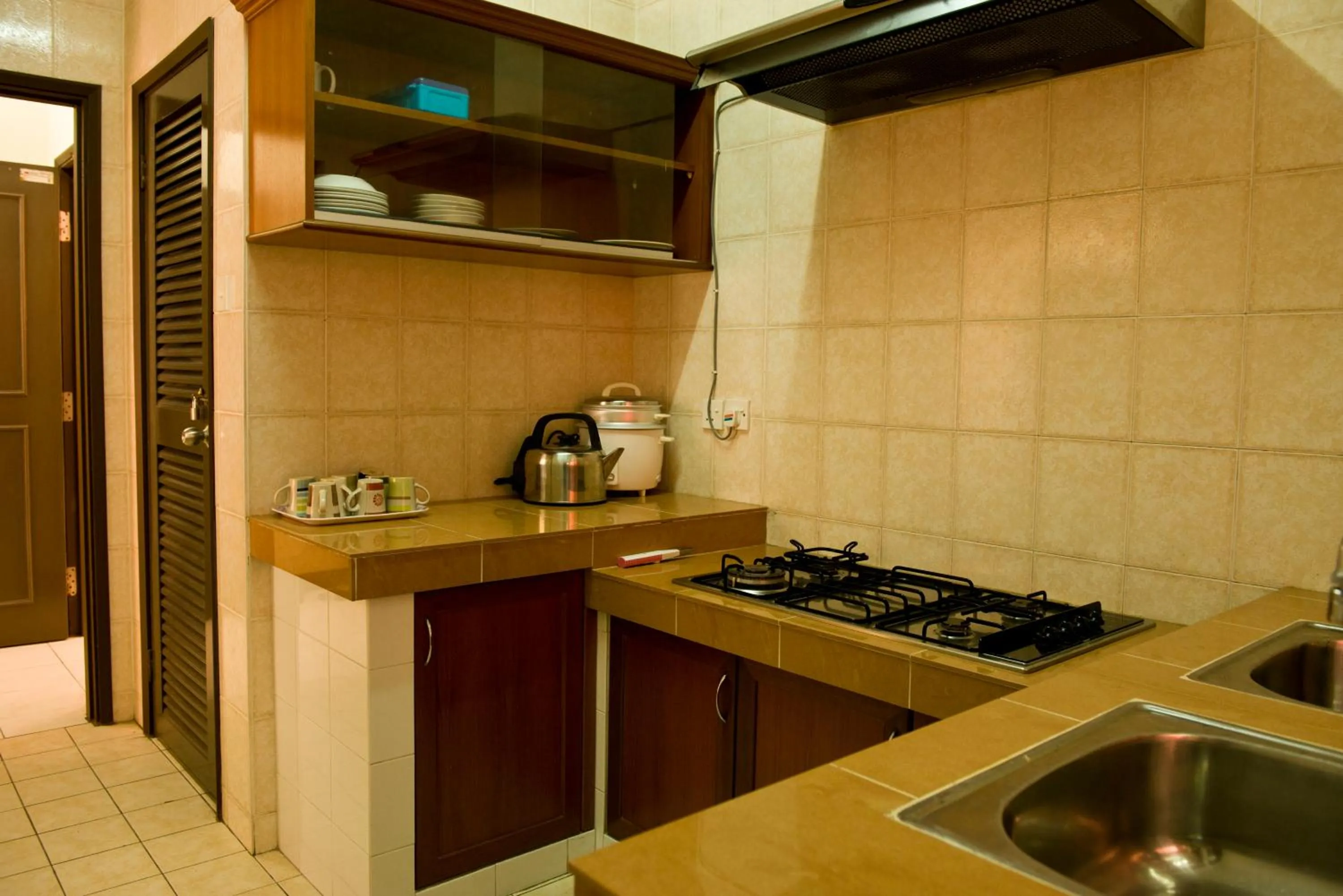 Kitchen or kitchenette in Nana Marina Court