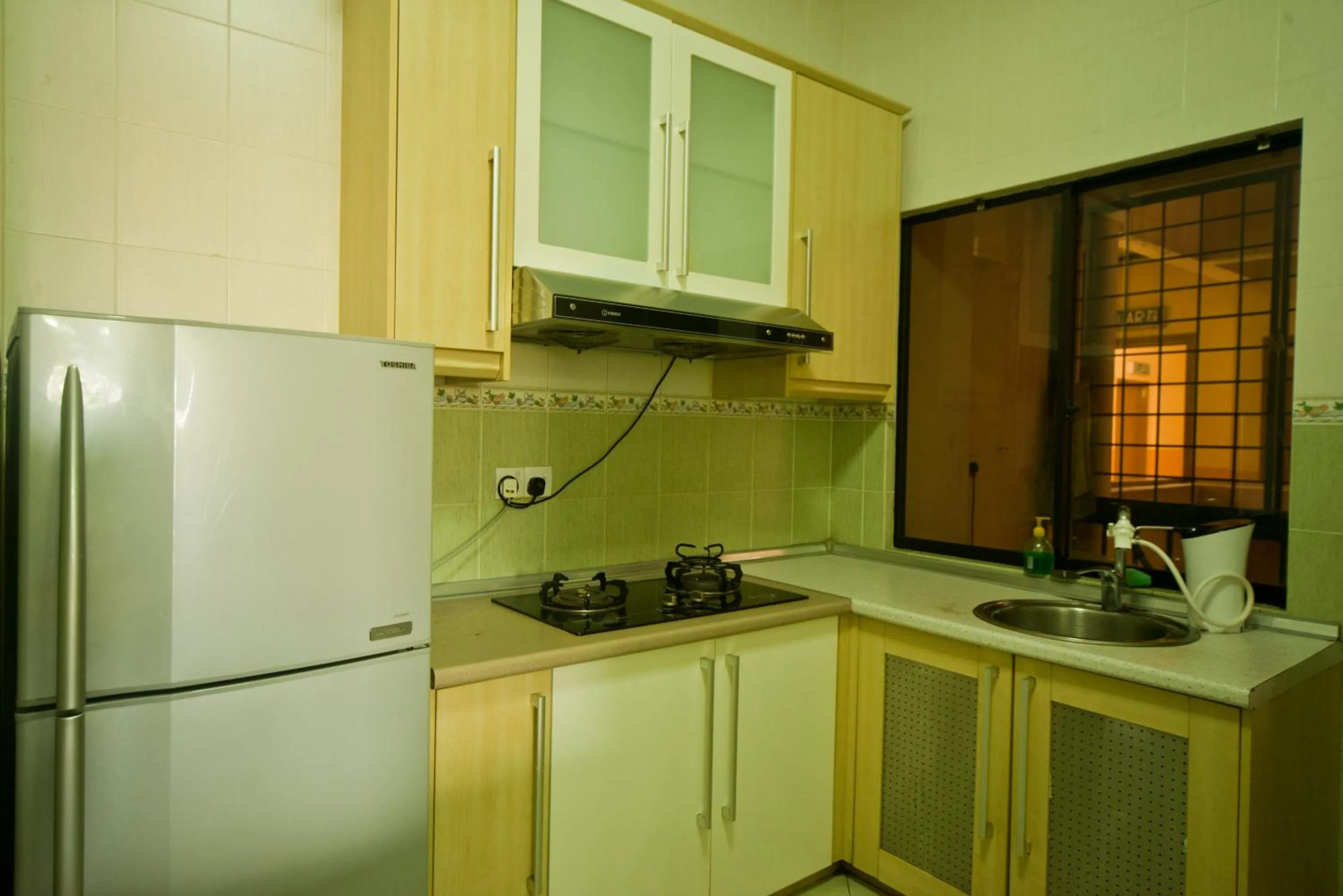 Kitchen or kitchenette in Nana Marina Court