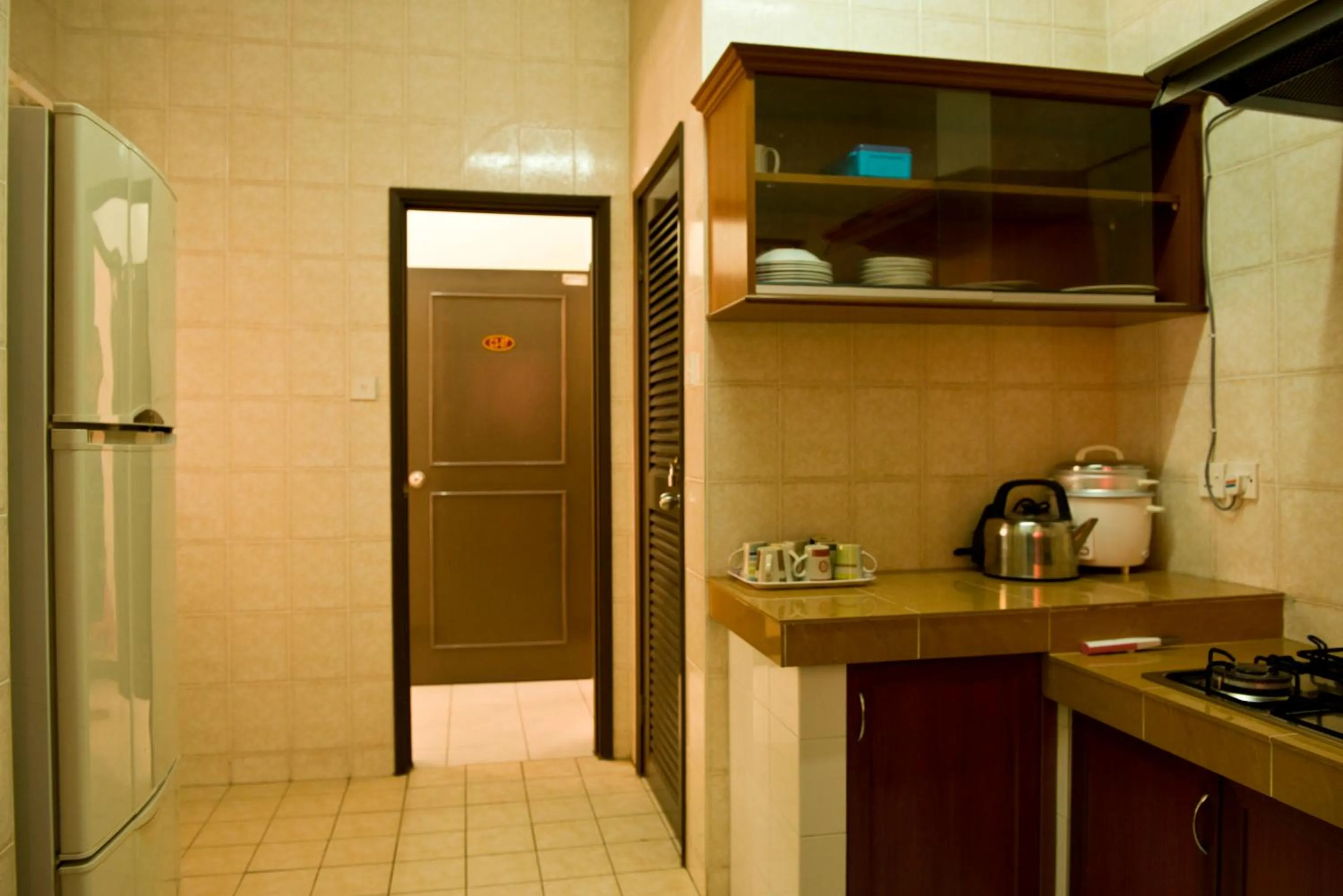 Kitchen or kitchenette in Nana Marina Court