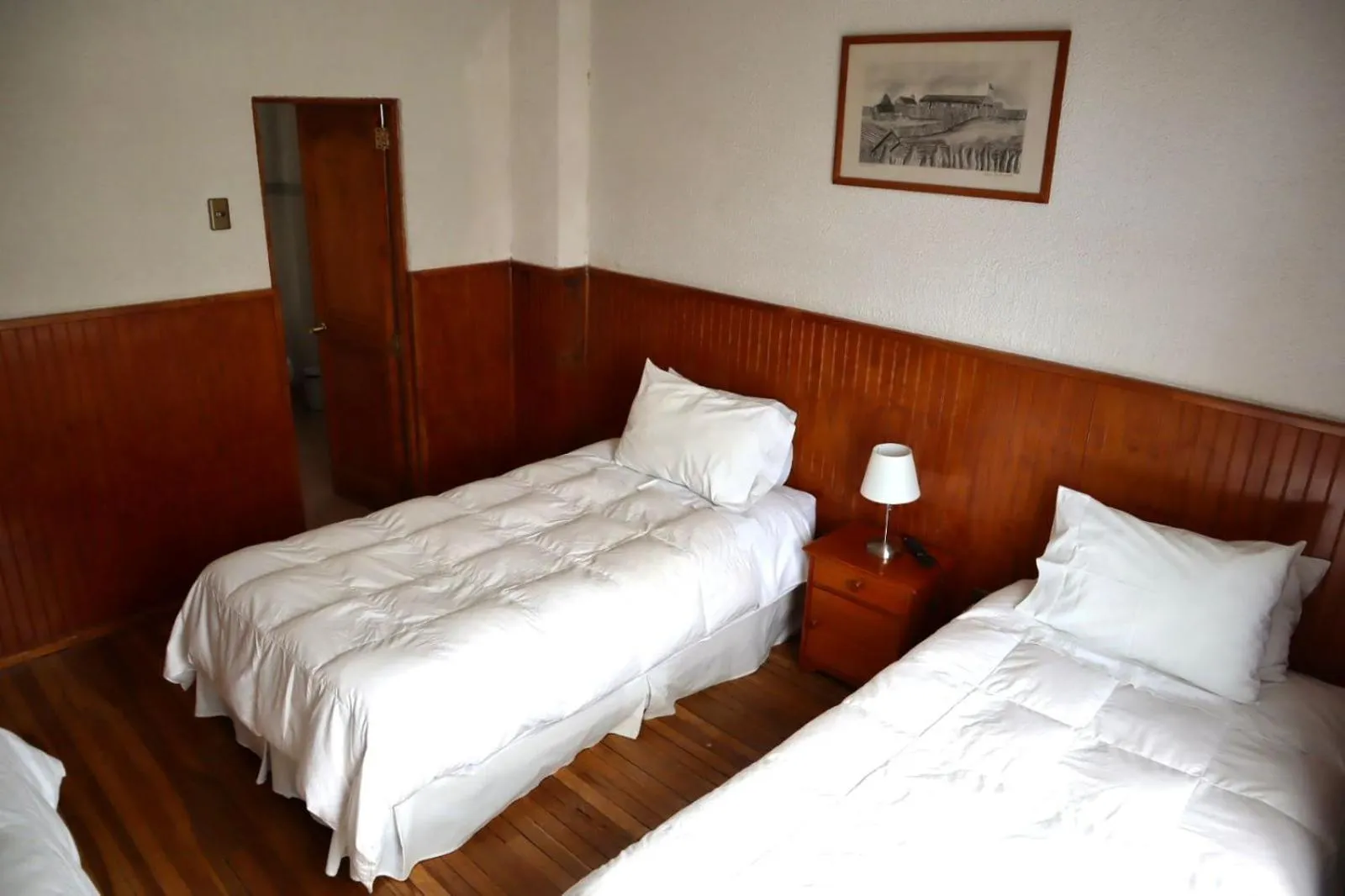 Bed in CHALET CHAPITAL Punta Arenas
