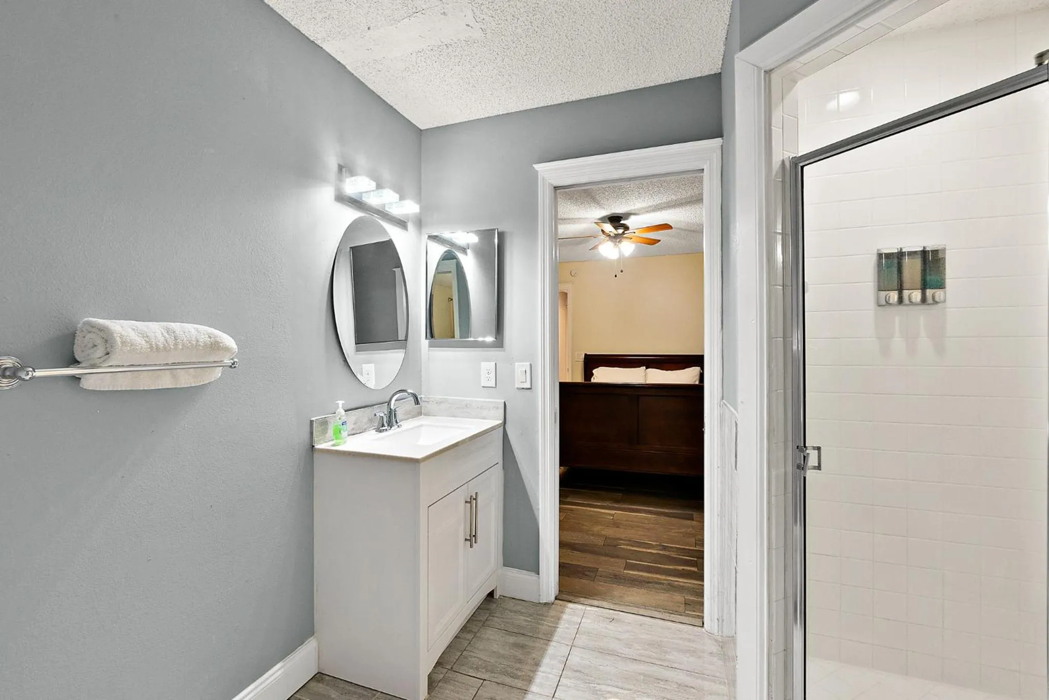 Shower in Tropical Escape with Relaxing Heated Pool & Palm Breezes