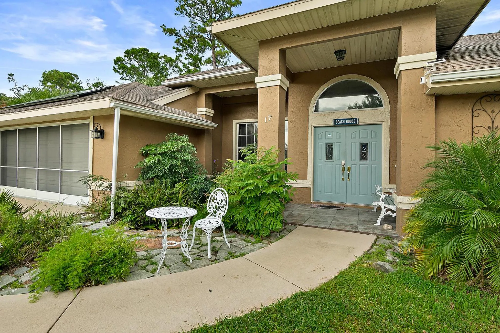 Patio in Tropical Escape with Relaxing Heated Pool & Palm Breezes