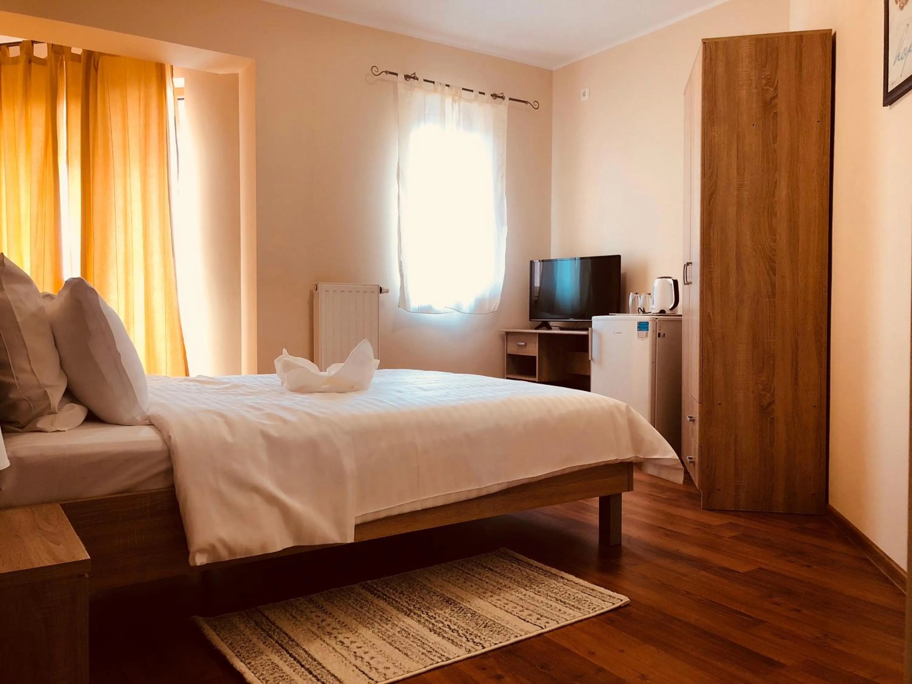 Bed in Monte Carlo Palace Rooms