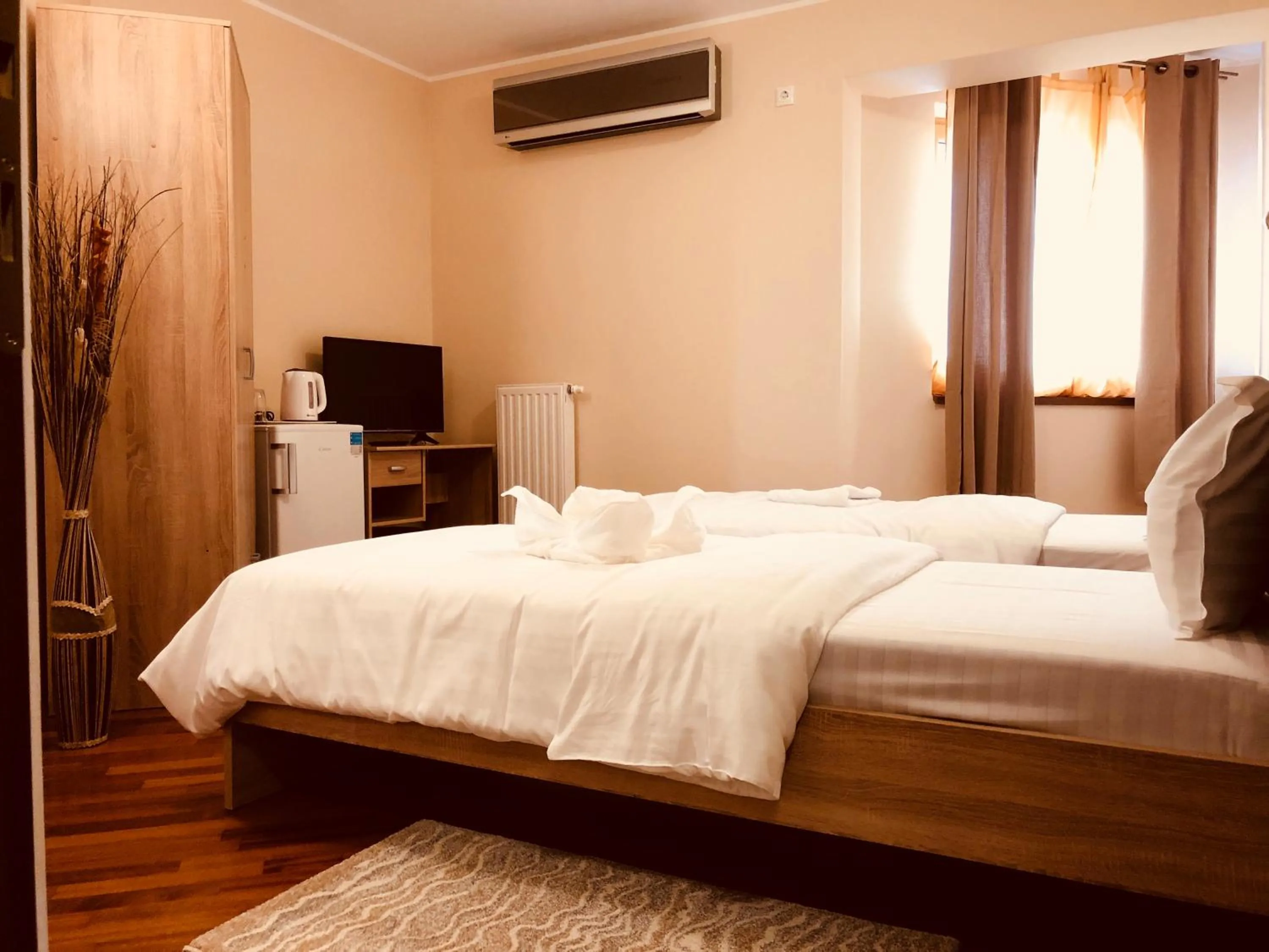 Bed in Monte Carlo Palace Rooms