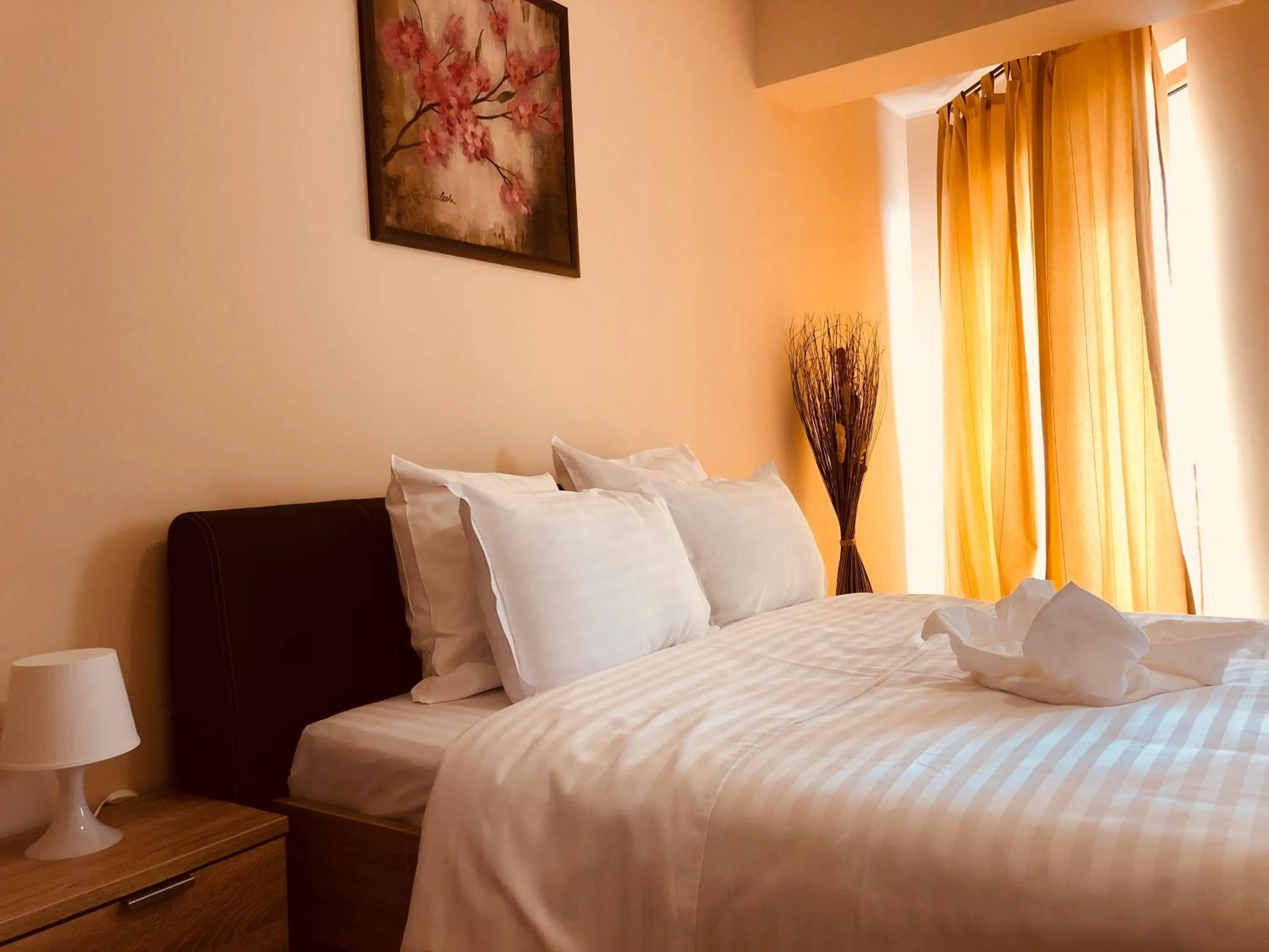 Bed in Monte Carlo Palace Rooms